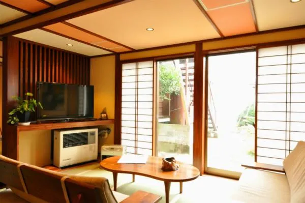 Communal lounge/ TV room in Shinano Sou