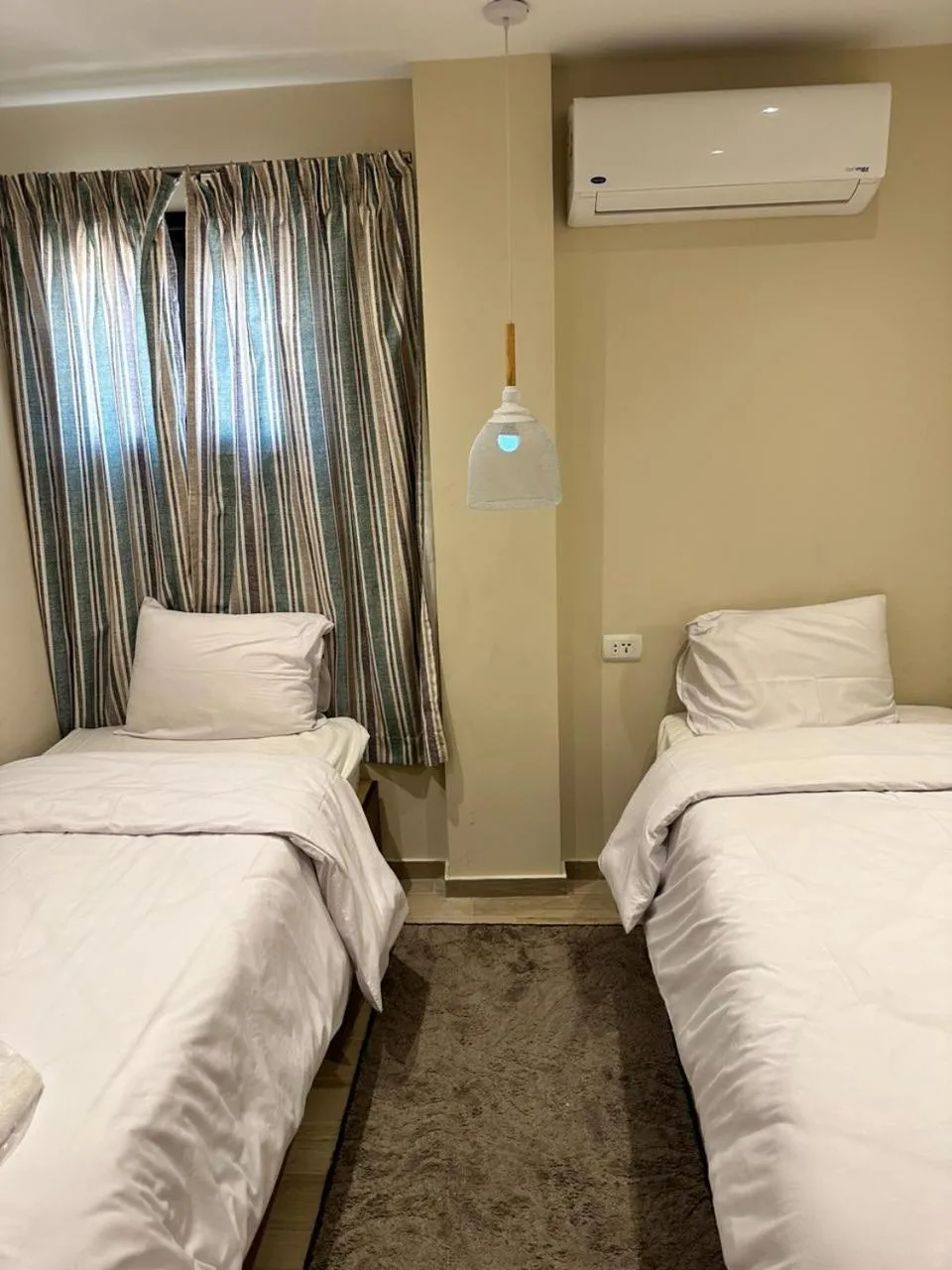 Bed in Nakhil Inn Residence