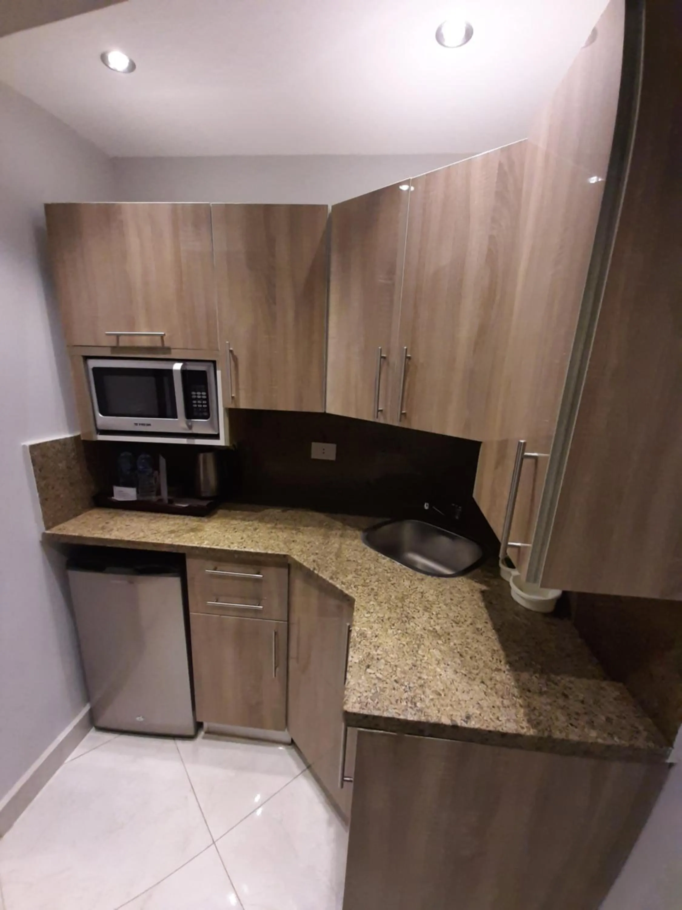 Kitchen or kitchenette in Nakhil Inn Residence