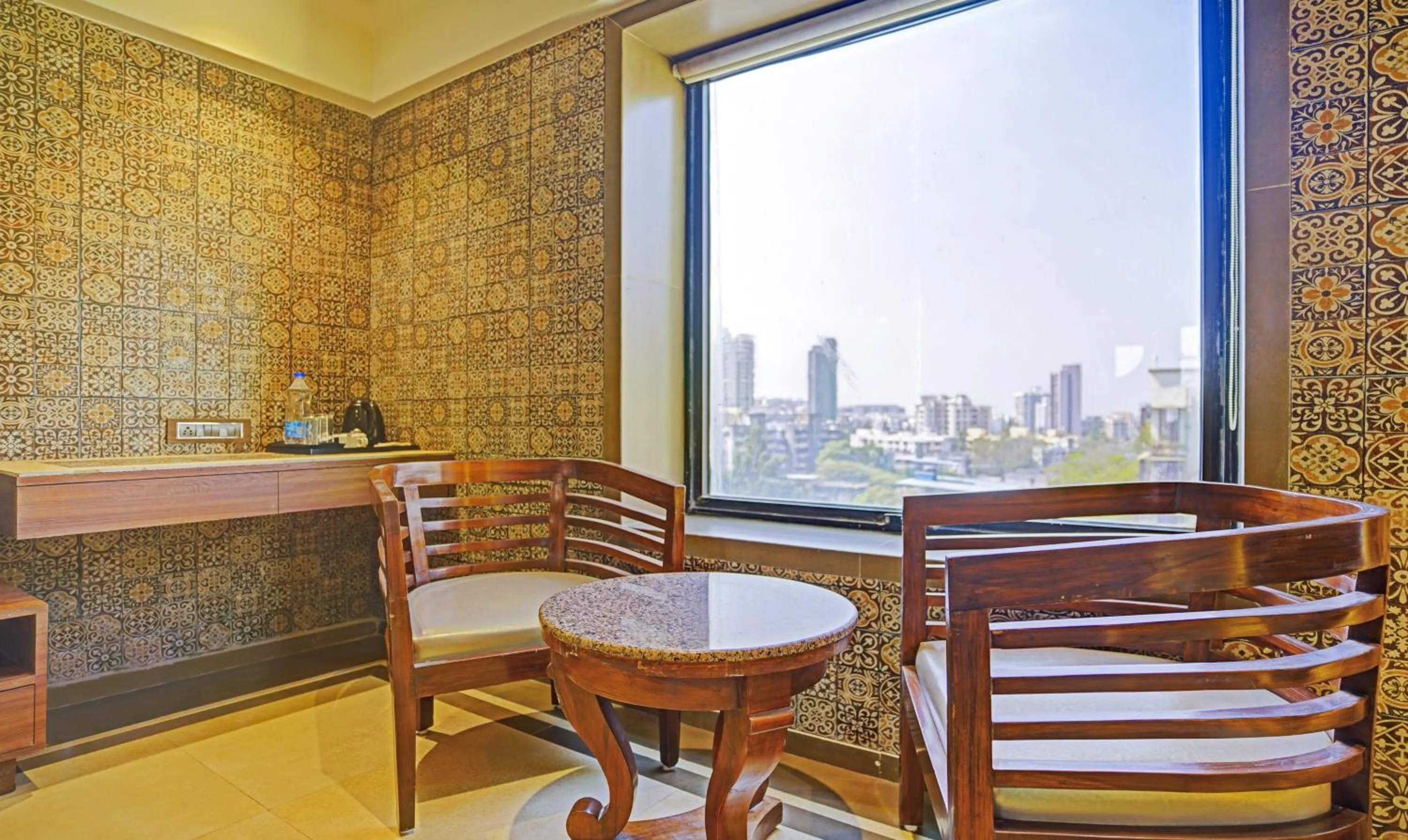 Seating area in Treebo Olive Nest