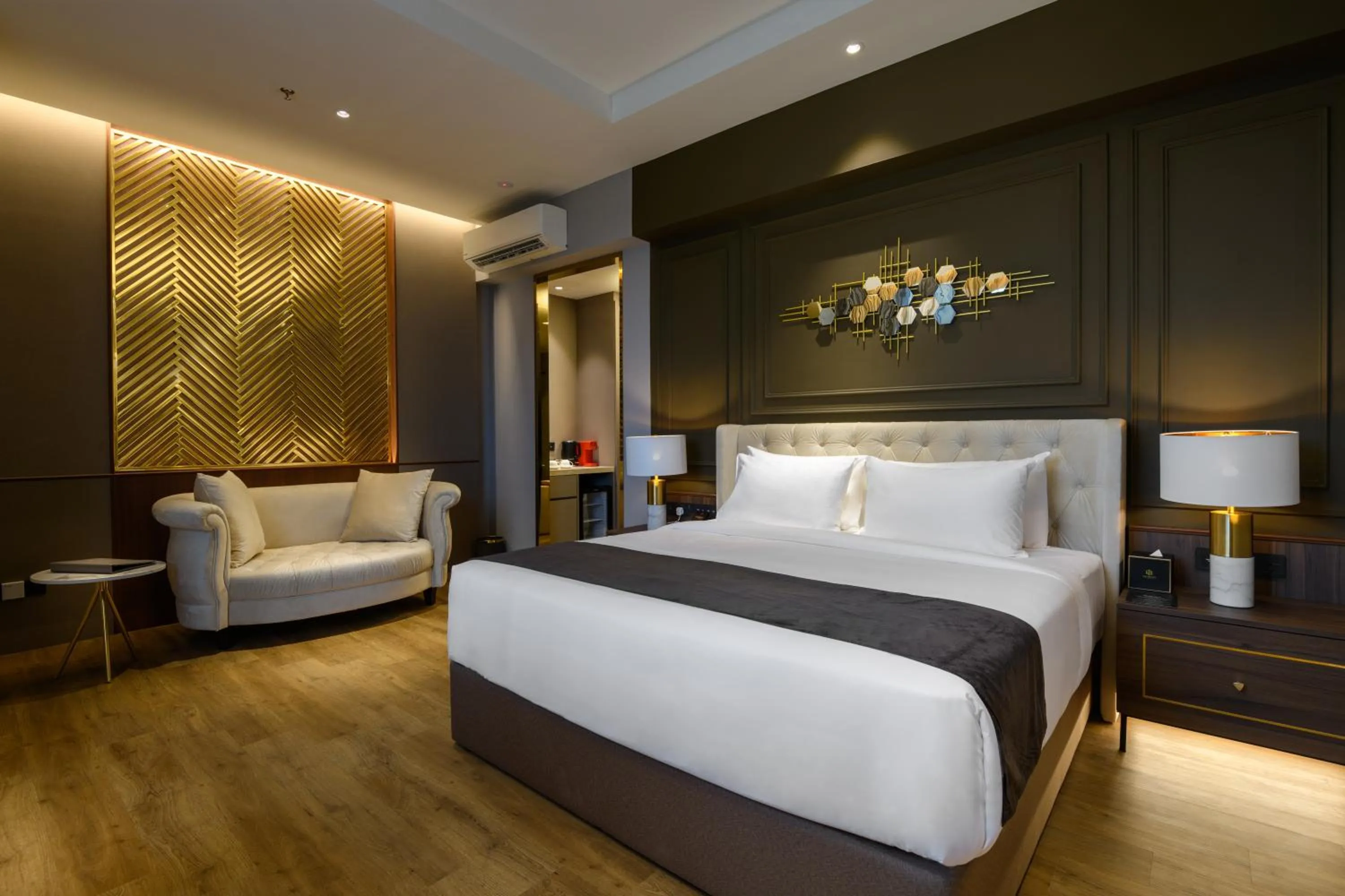 Bed in The Granite Luxury Hotel Penang