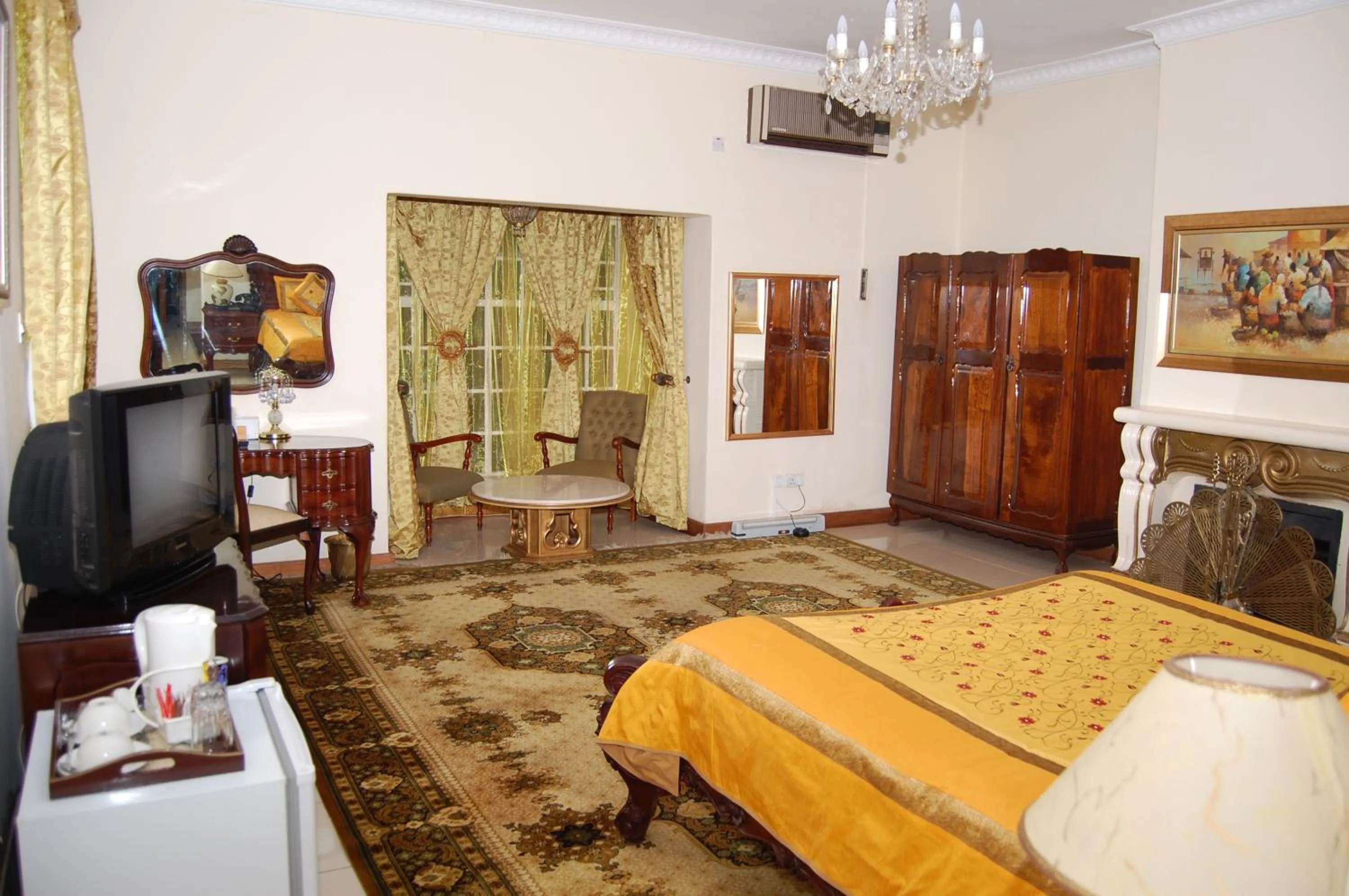 Bed in Falcon Crest Suites