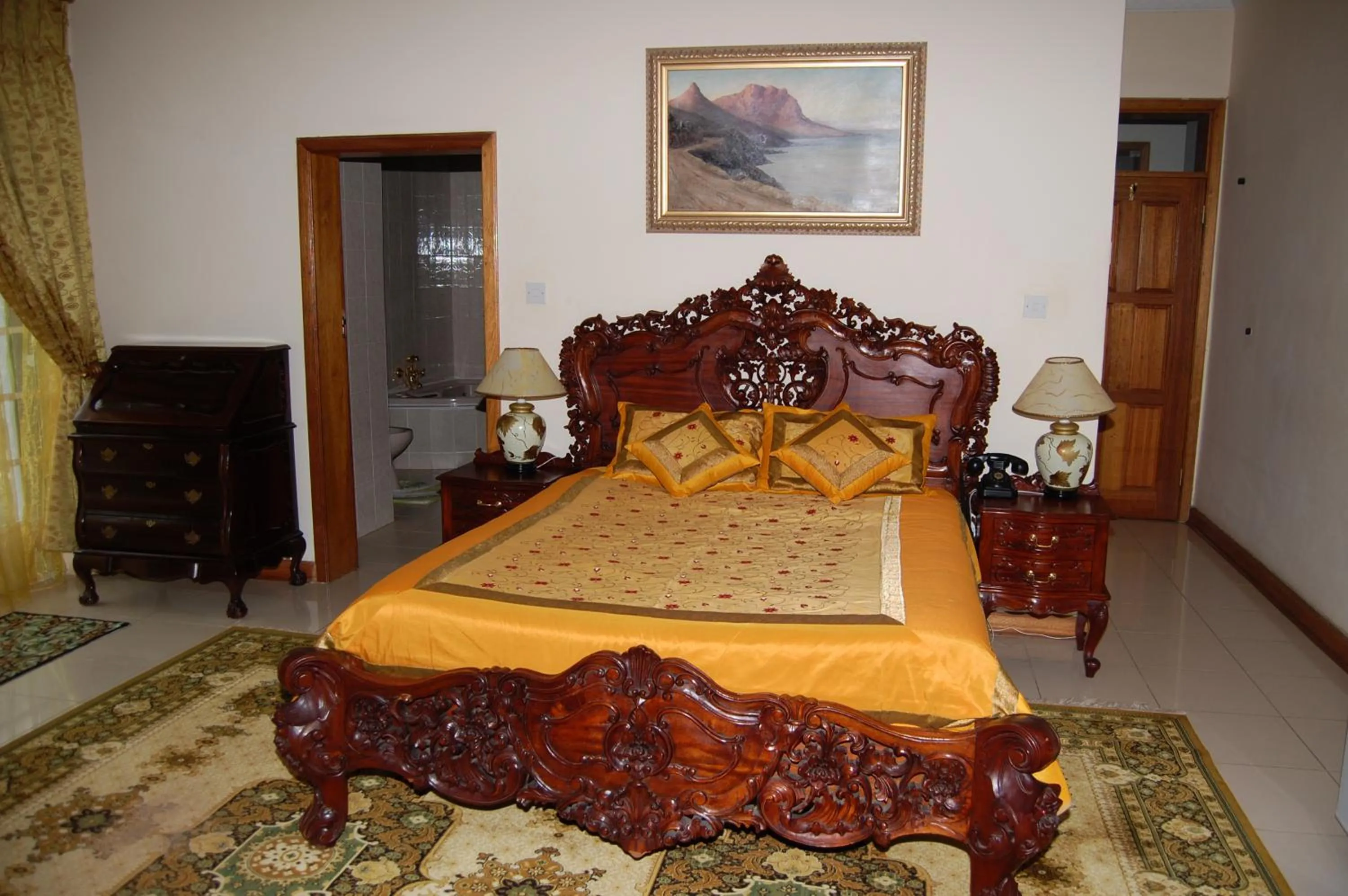 Bed in Falcon Crest Suites