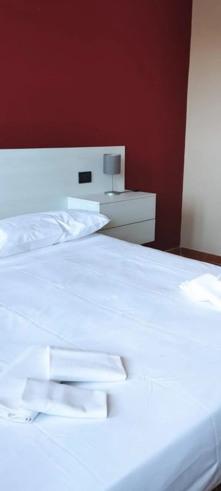 Photo of the whole room, Bed in Le Residenze di Santa Costanza - Il Lentisco