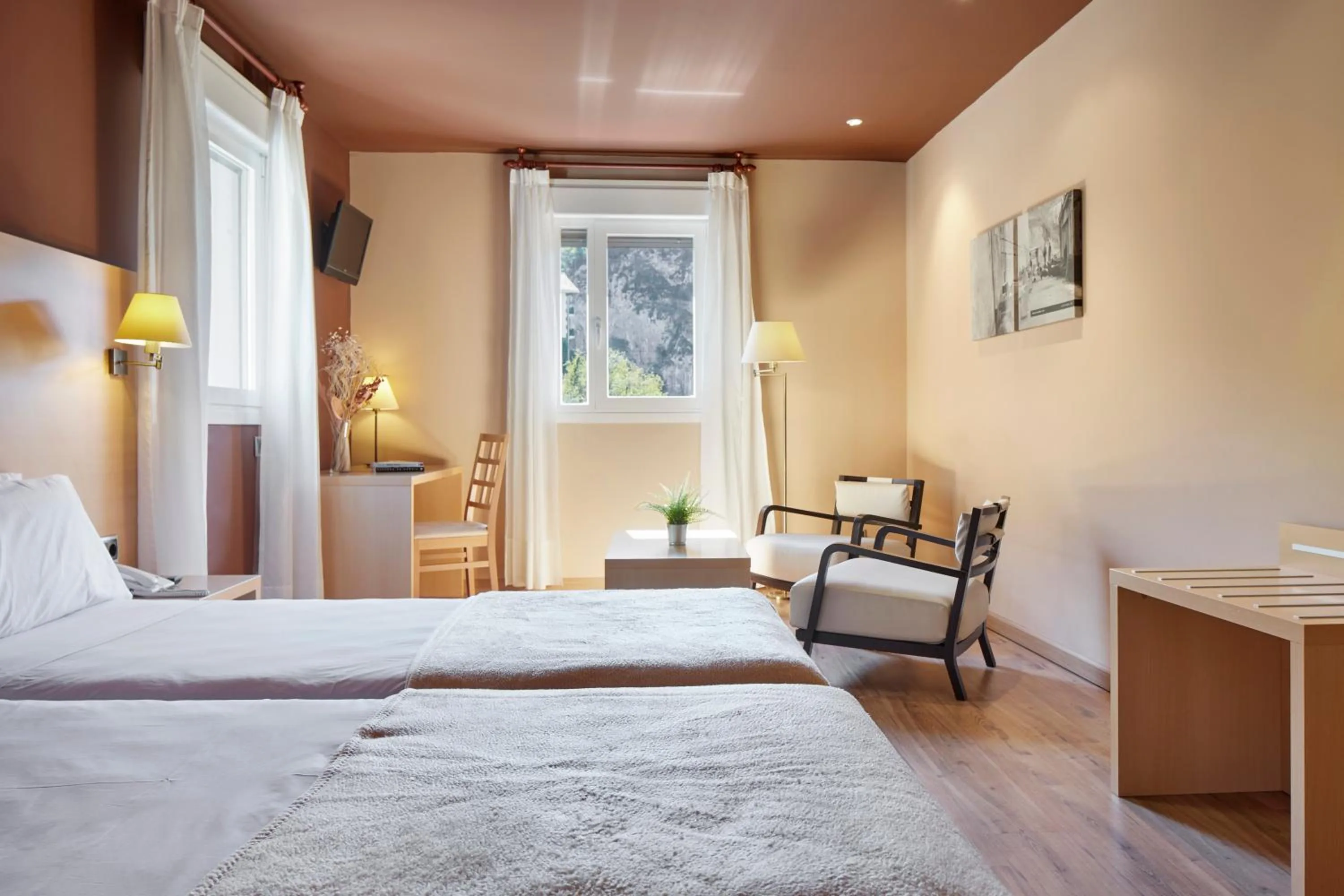 Seating area, Bed in Iraipe Santuario de Arantzazu Hotel