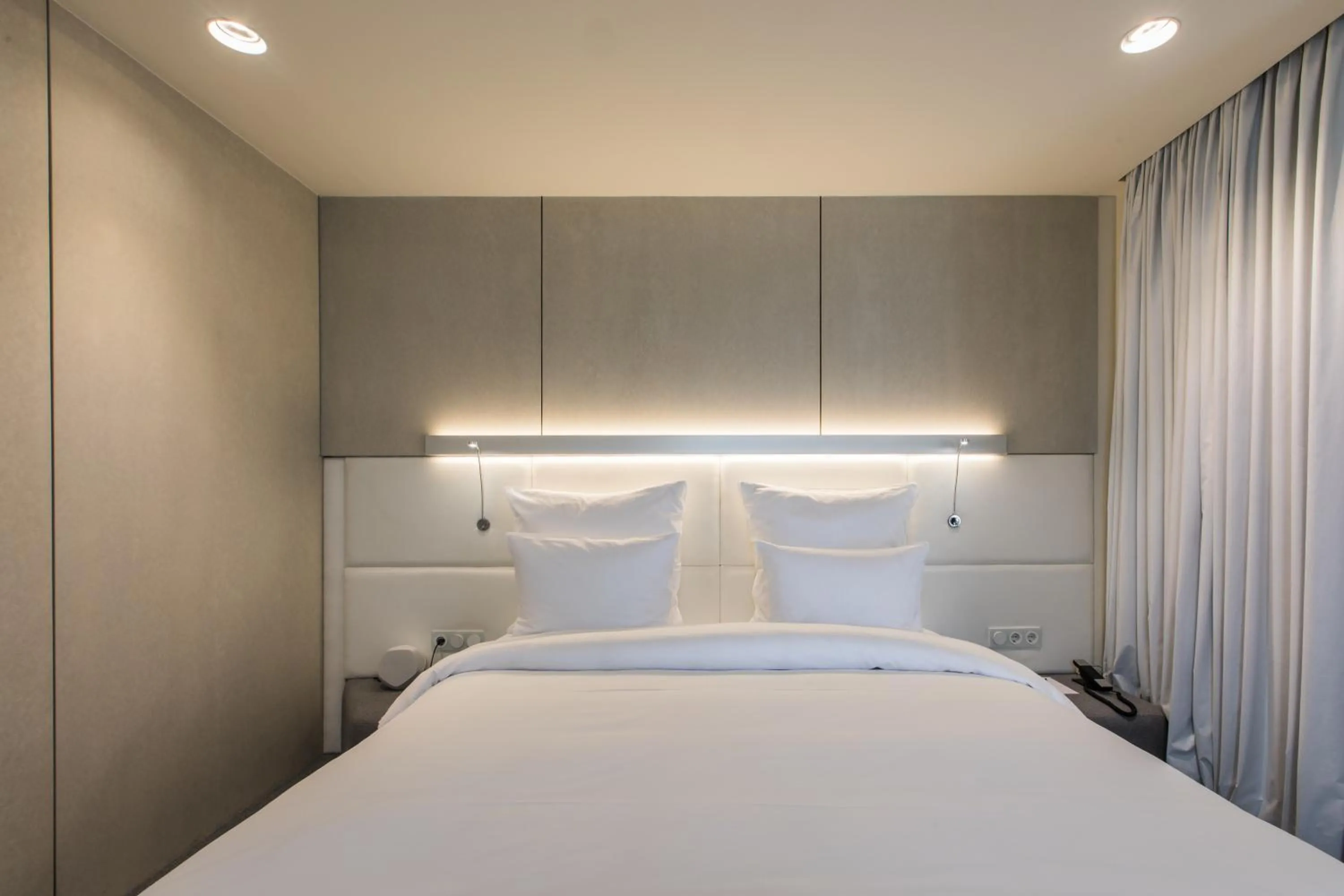 Bed in The Grove Design Hotel