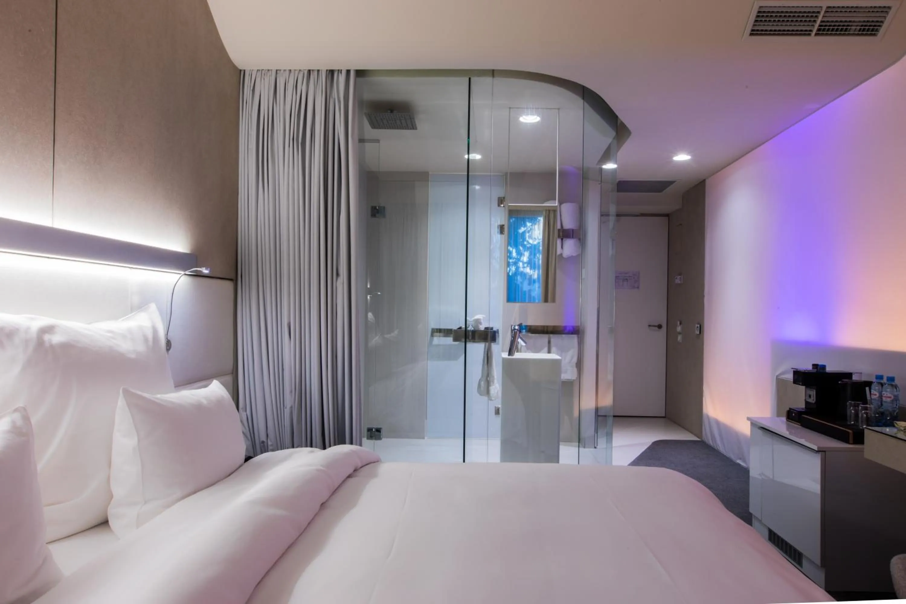 Bed in The Grove Design Hotel