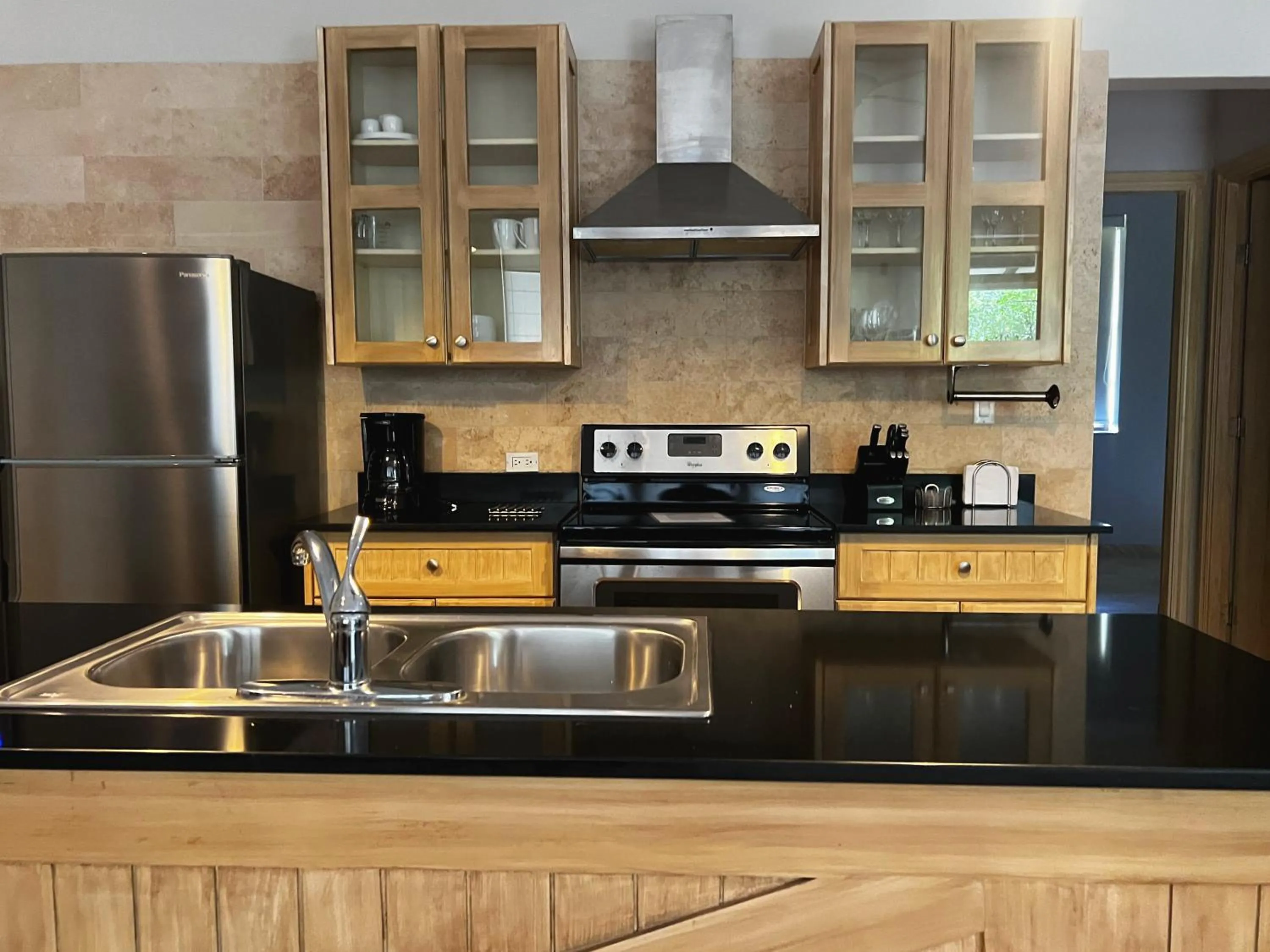 Kitchen or kitchenette in Paseo Suites El Valle, Luxury Apartments
