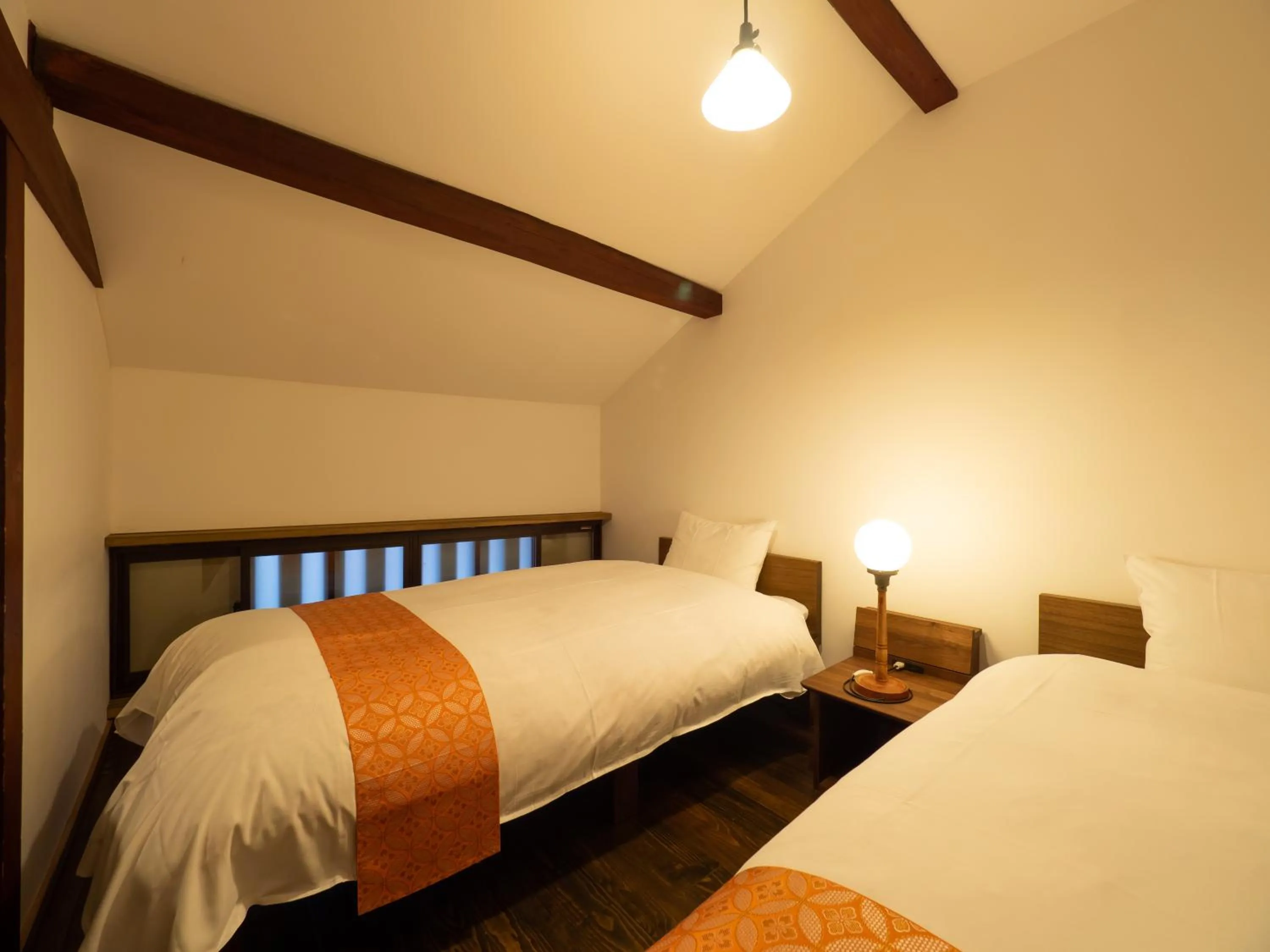 Bed in Inase Otsu Machiya Bed and Breakfast