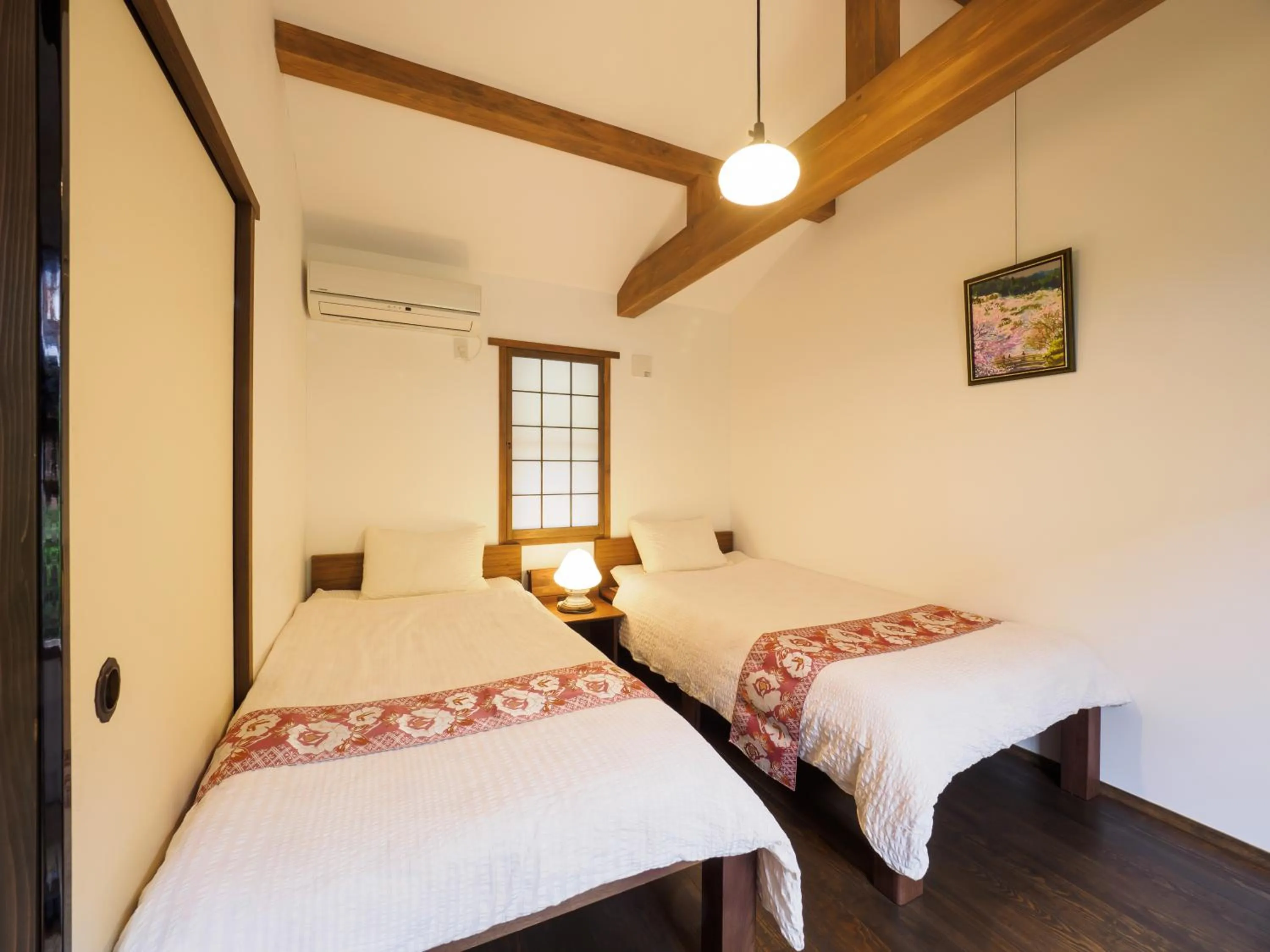 Bed in Inase Otsu Machiya Bed and Breakfast