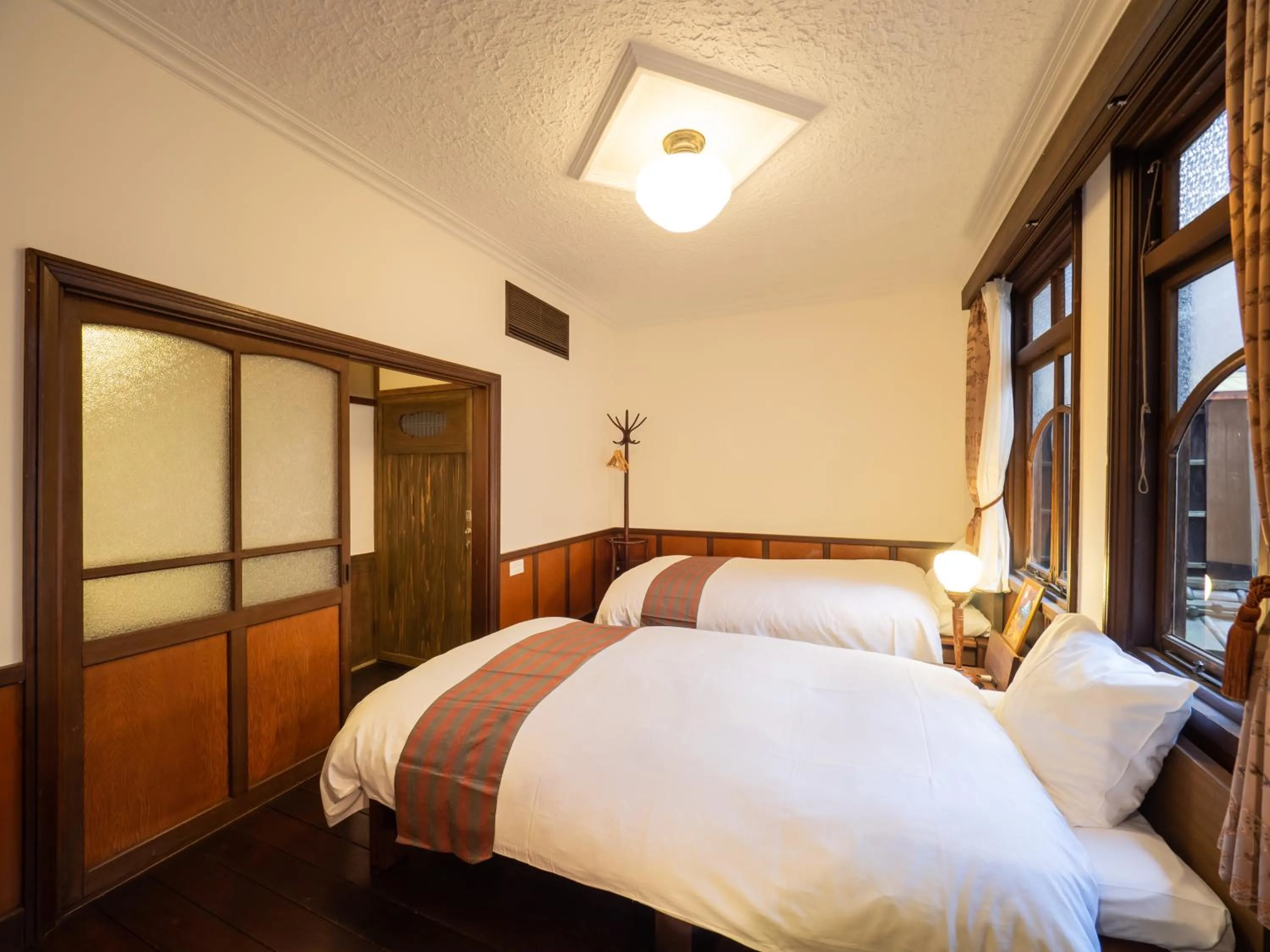 Bed in Inase Otsu Machiya Bed and Breakfast