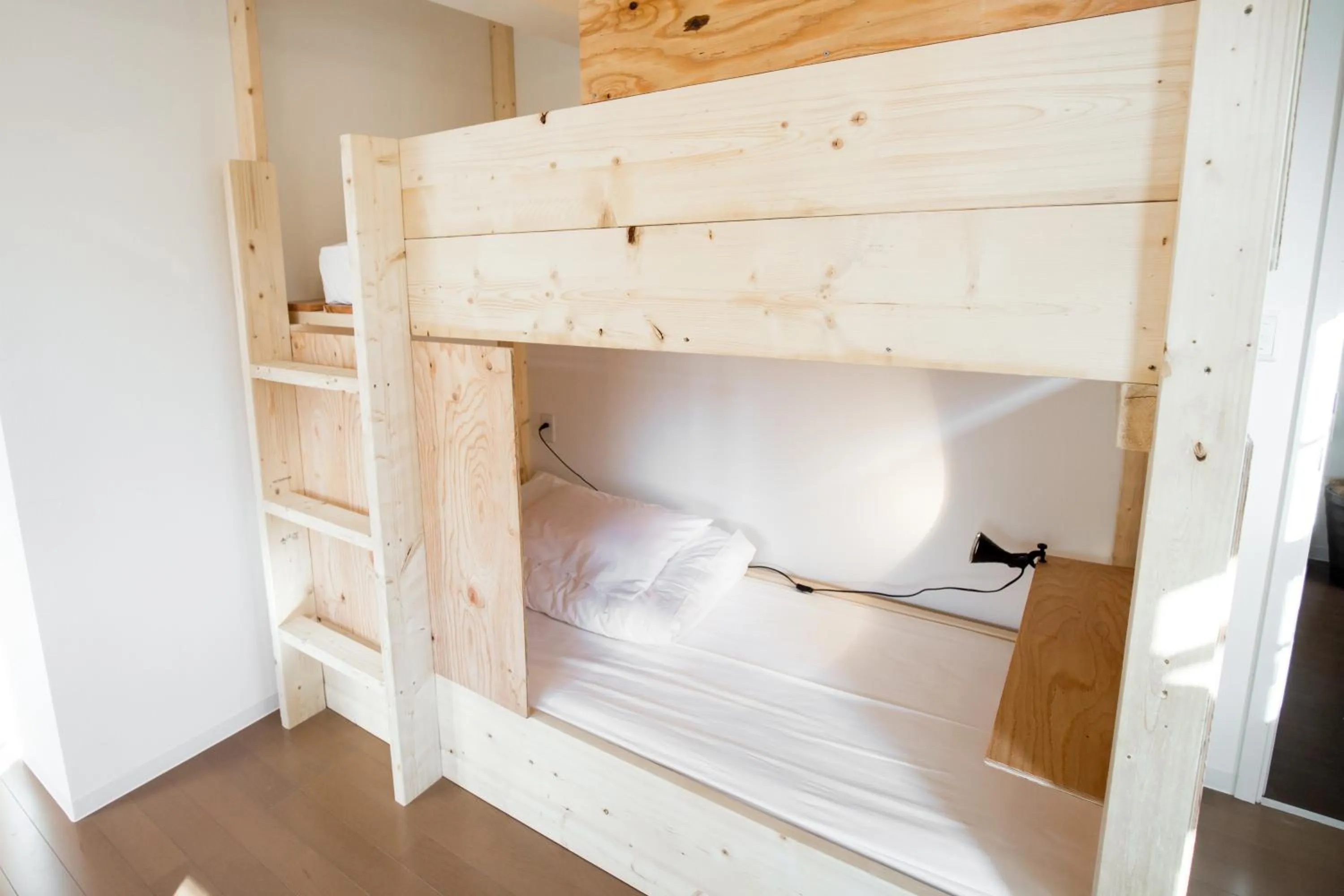 Bed in IZA Enoshima Guest House and Bar