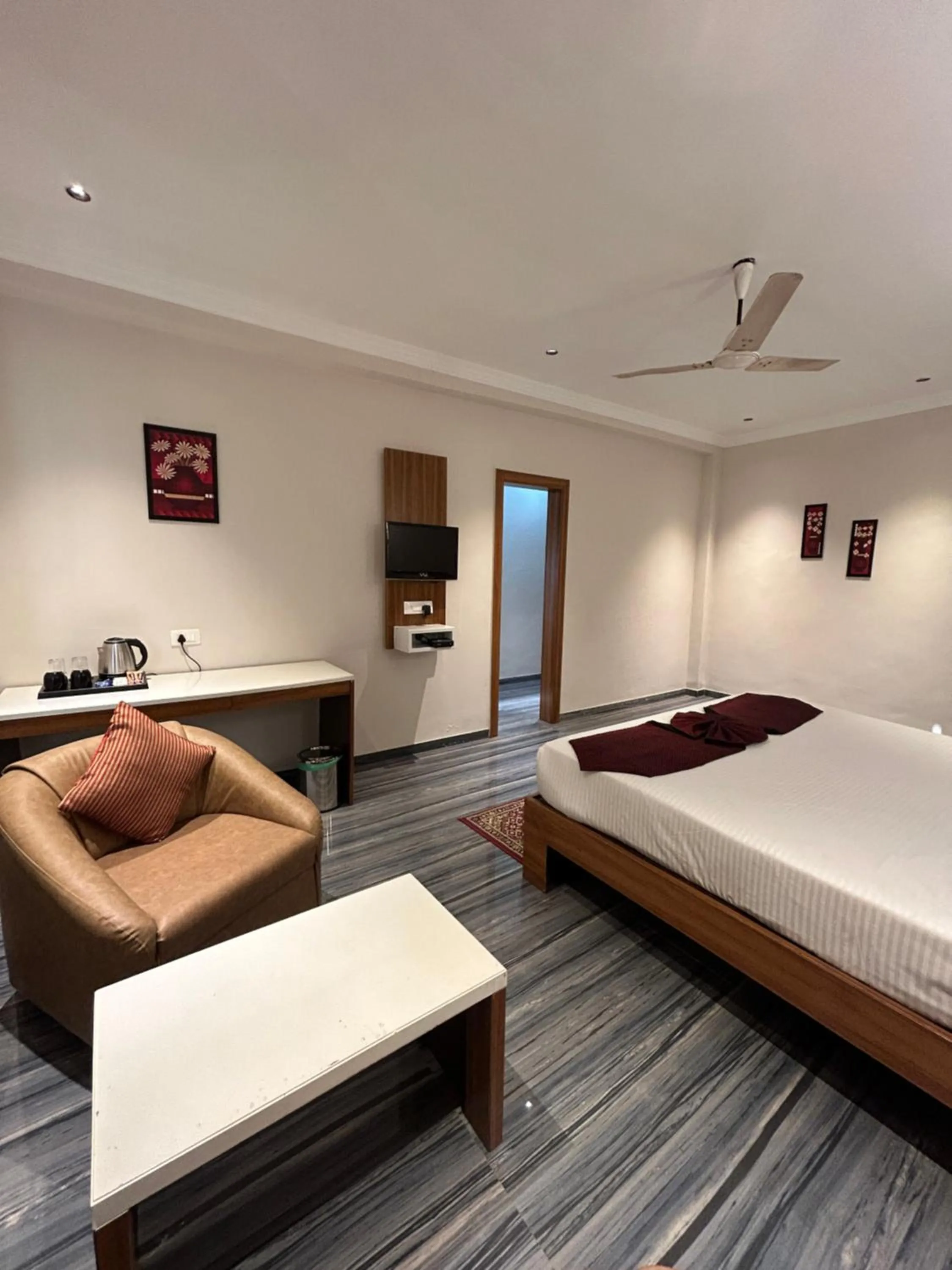 Photo of the whole room, Bed in Alba Premier Kolhapur
