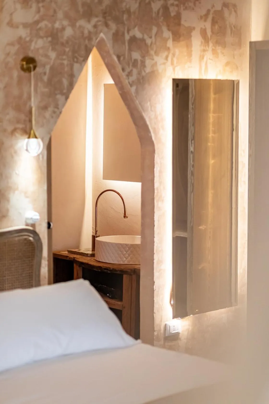 Decorative detail, Bed in Palazzo Sant'Anna Lecce