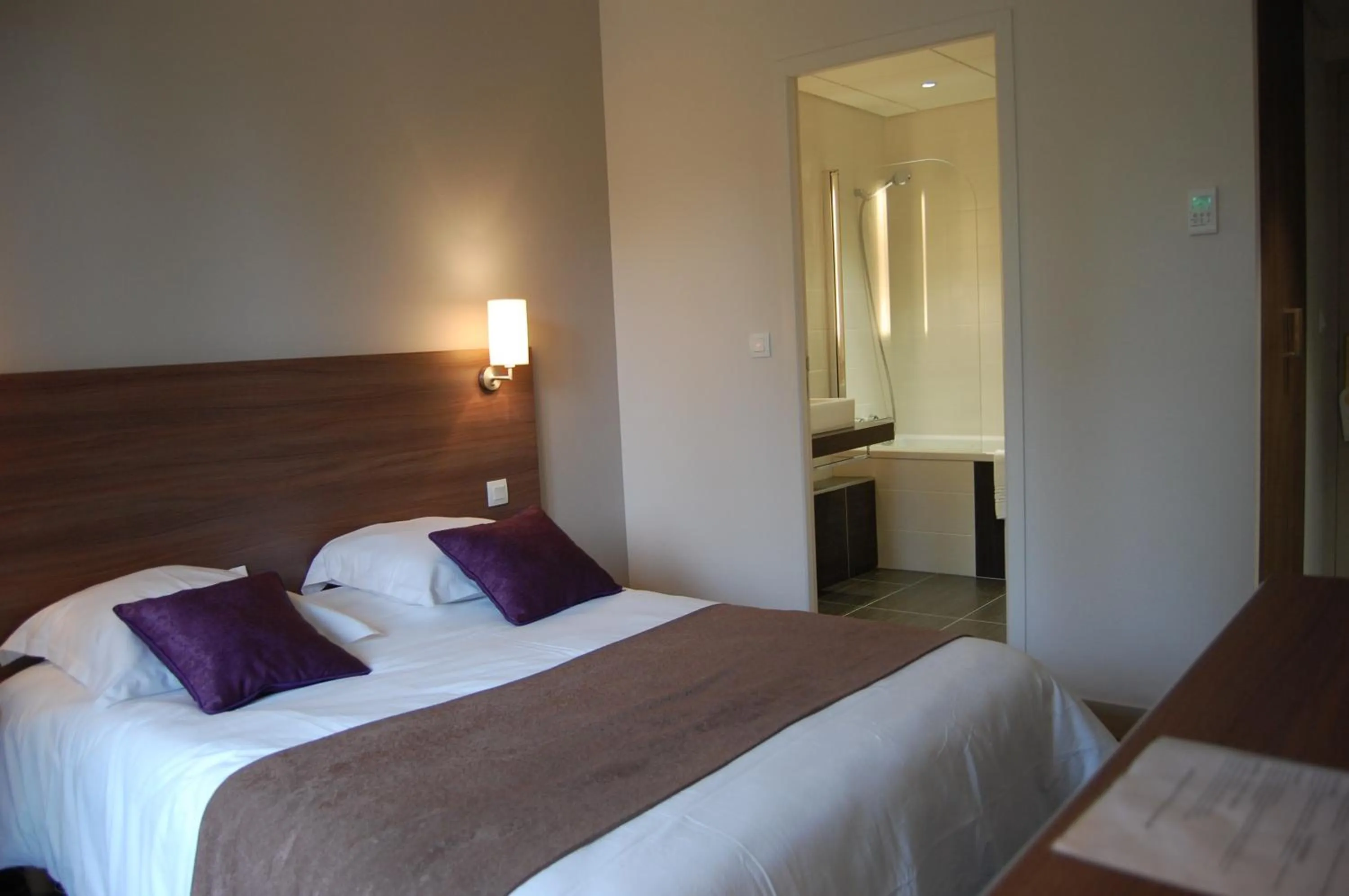 Photo of the whole room, Bed in Logis Hôtels- Hôtel et Restaurant Domaine de Fompeyre