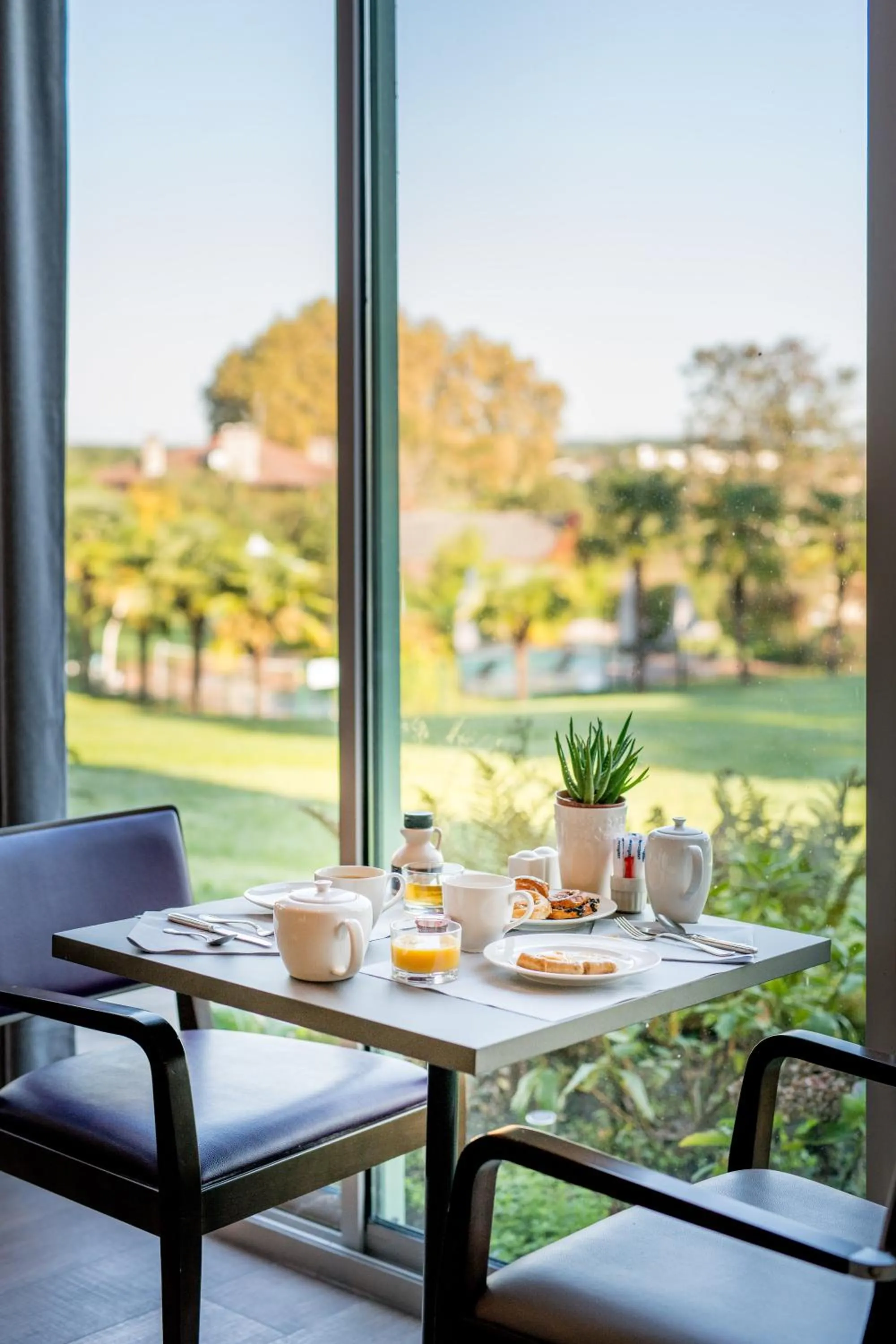Garden view in Logis Hôtels- Hôtel et Restaurant Domaine de Fompeyre