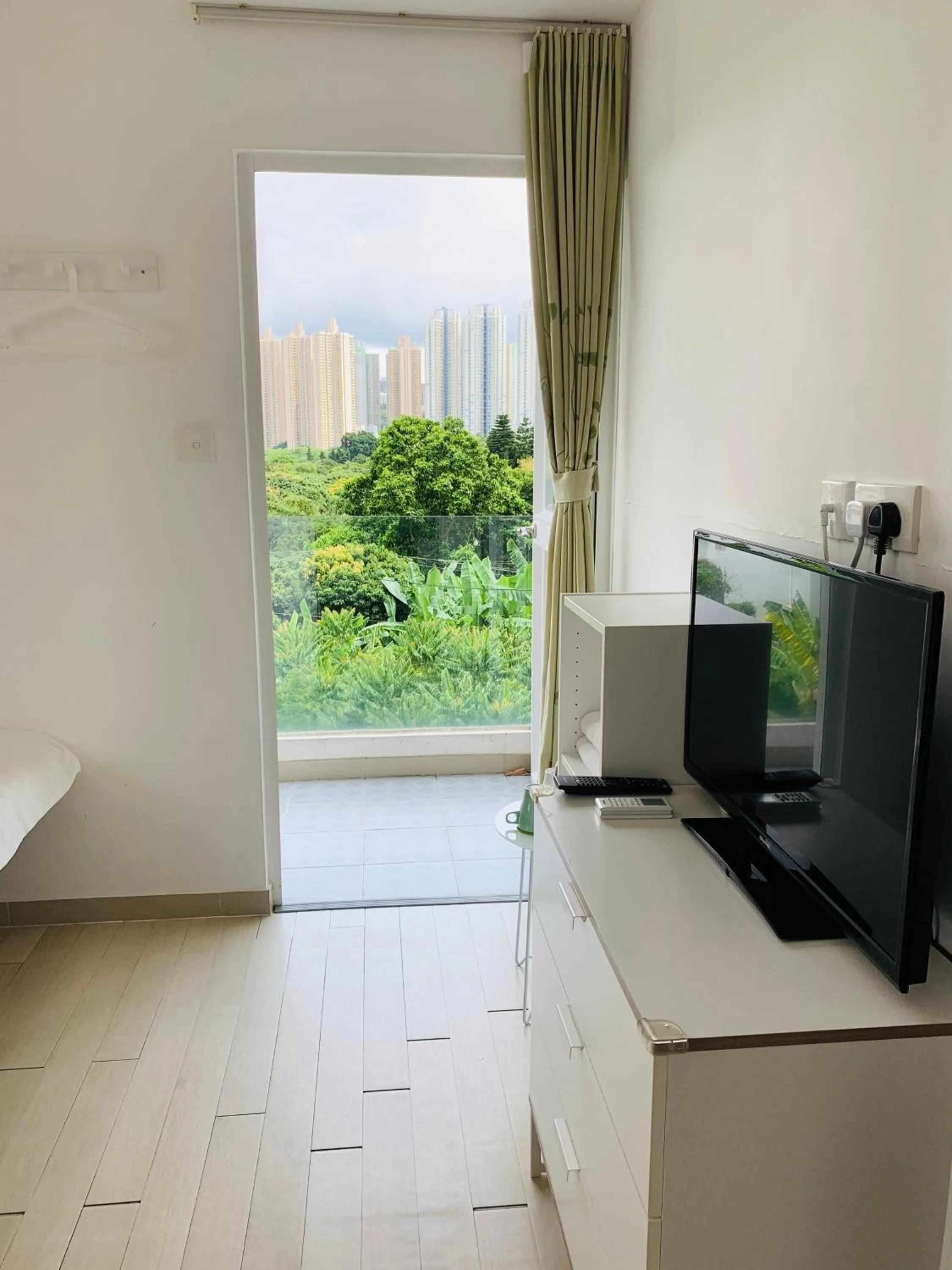 TV and multimedia in City Oasis Guesthouse