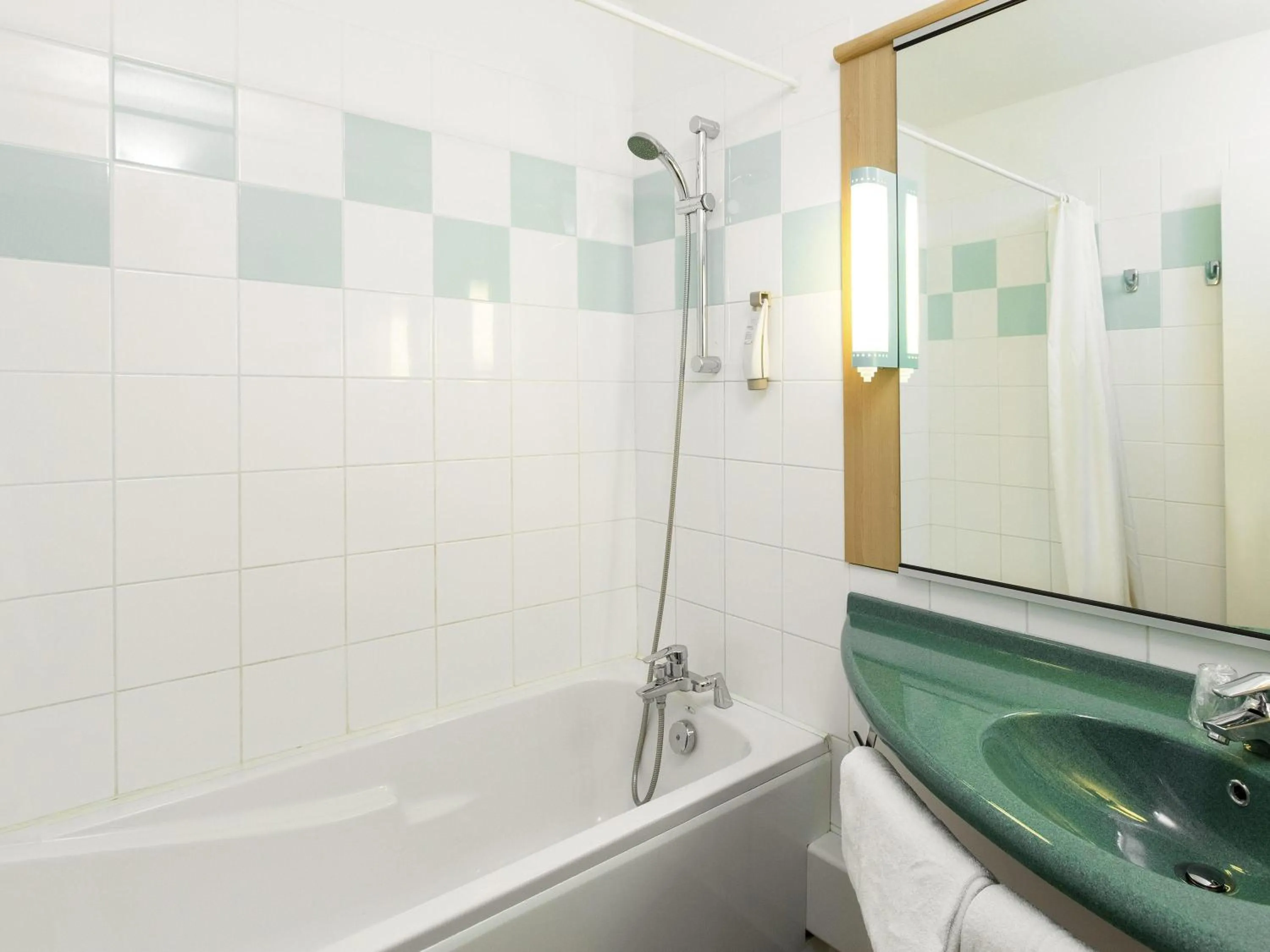 Bedroom in ibis La Bresse Gérardmer