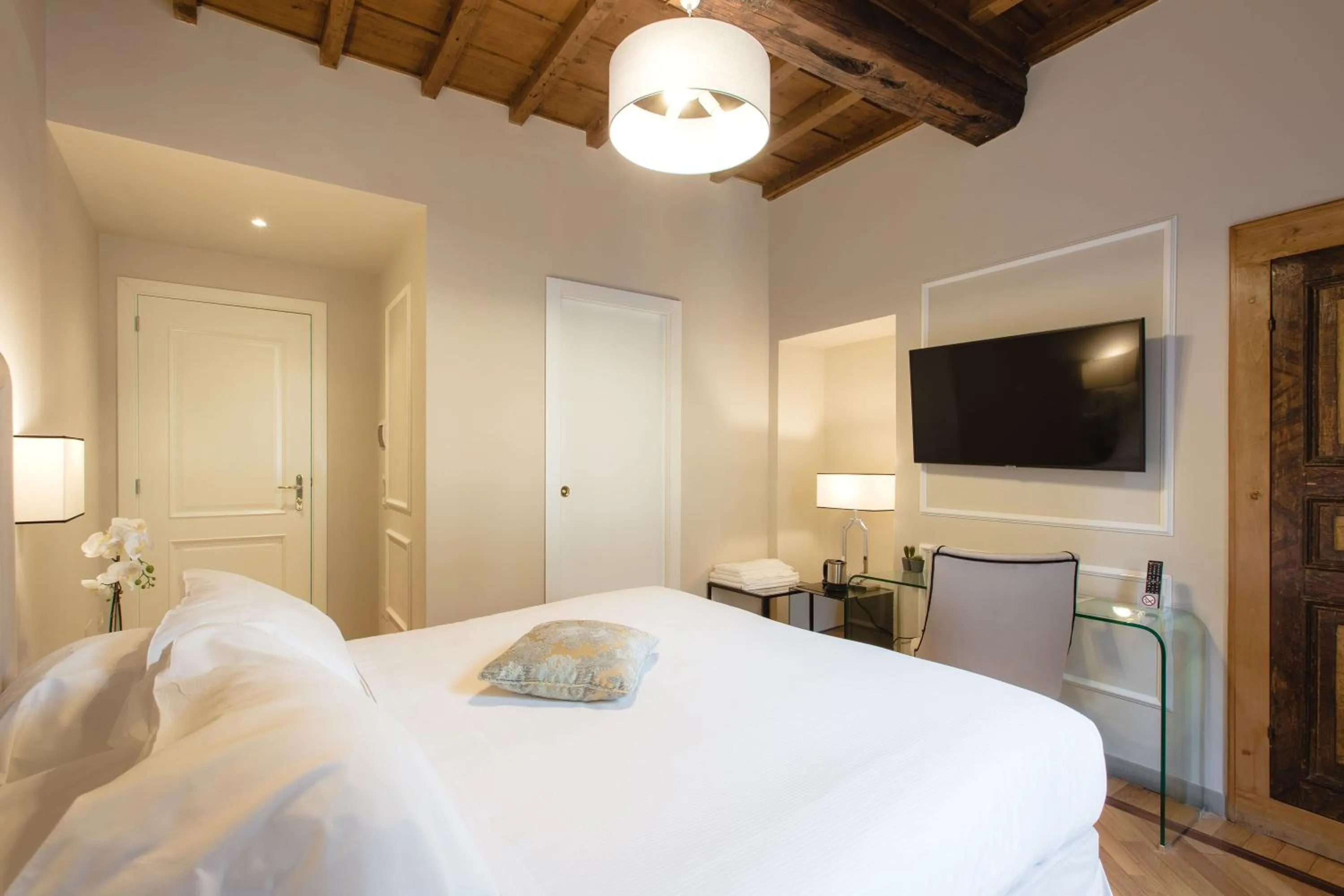 Bed in Relais Tosinghi