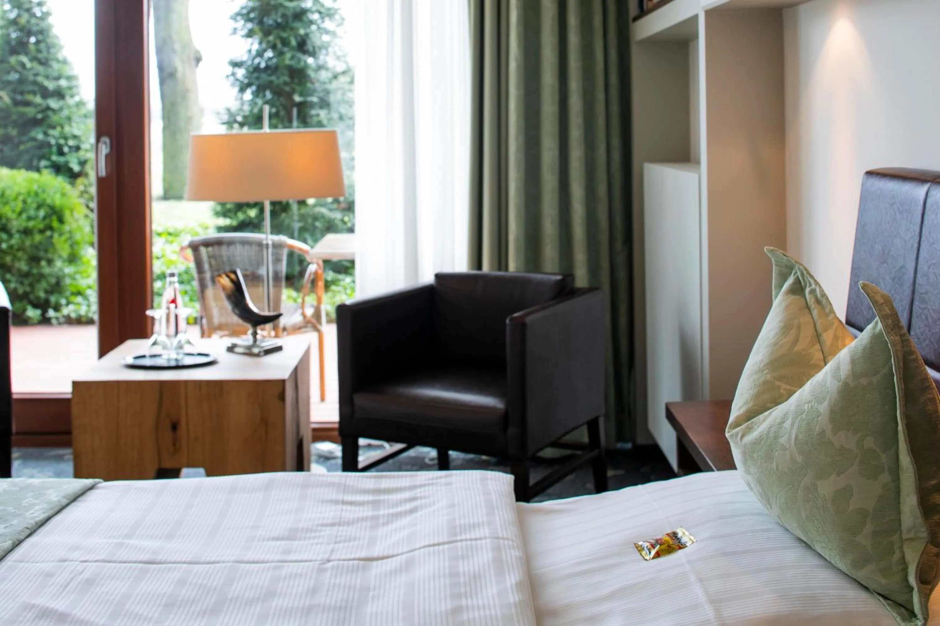 Seating area, Bed in Hotel Landhaus Pollmeyer