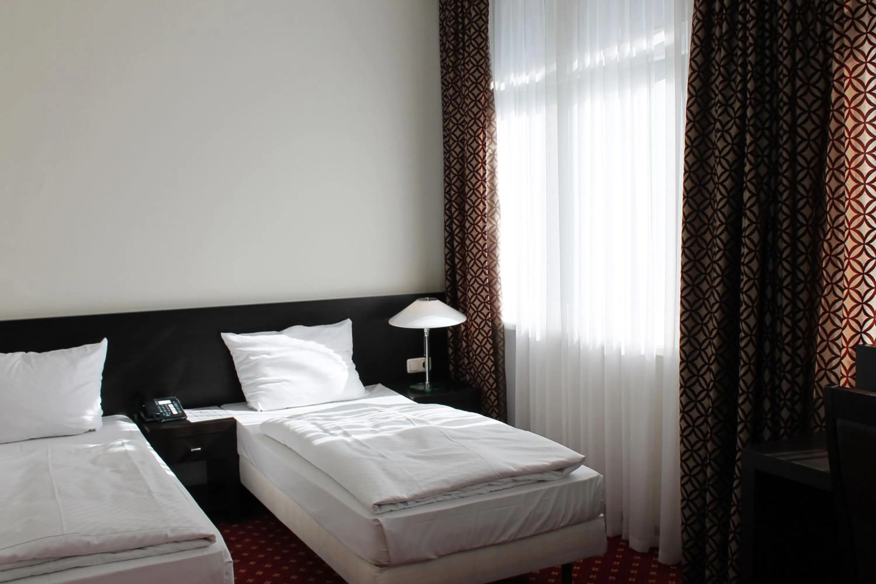 Bed in Aariana Hotel