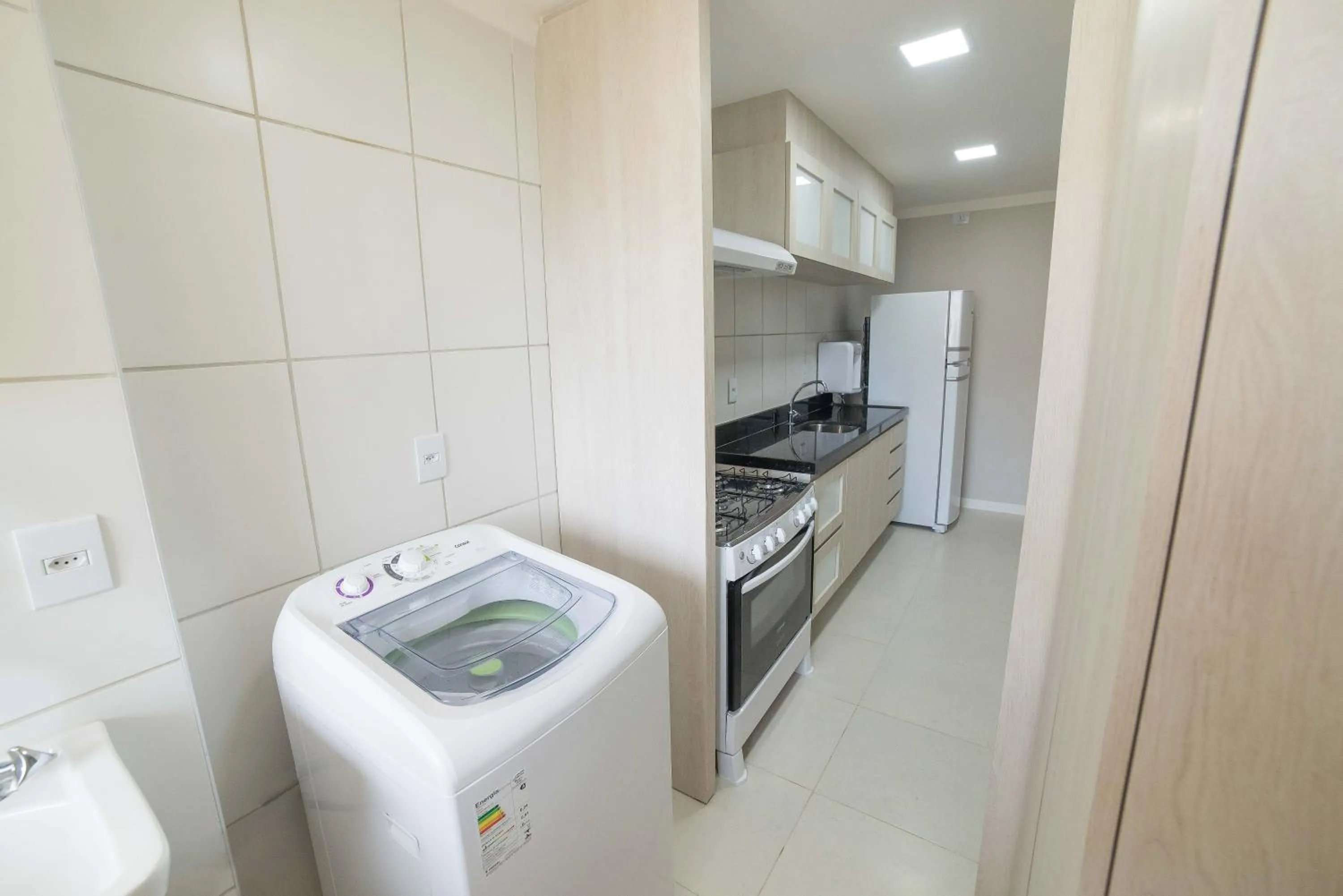Kitchen or kitchenette in Golf Ville Resort Brisa do Golf -Apartamentos e Cobertura