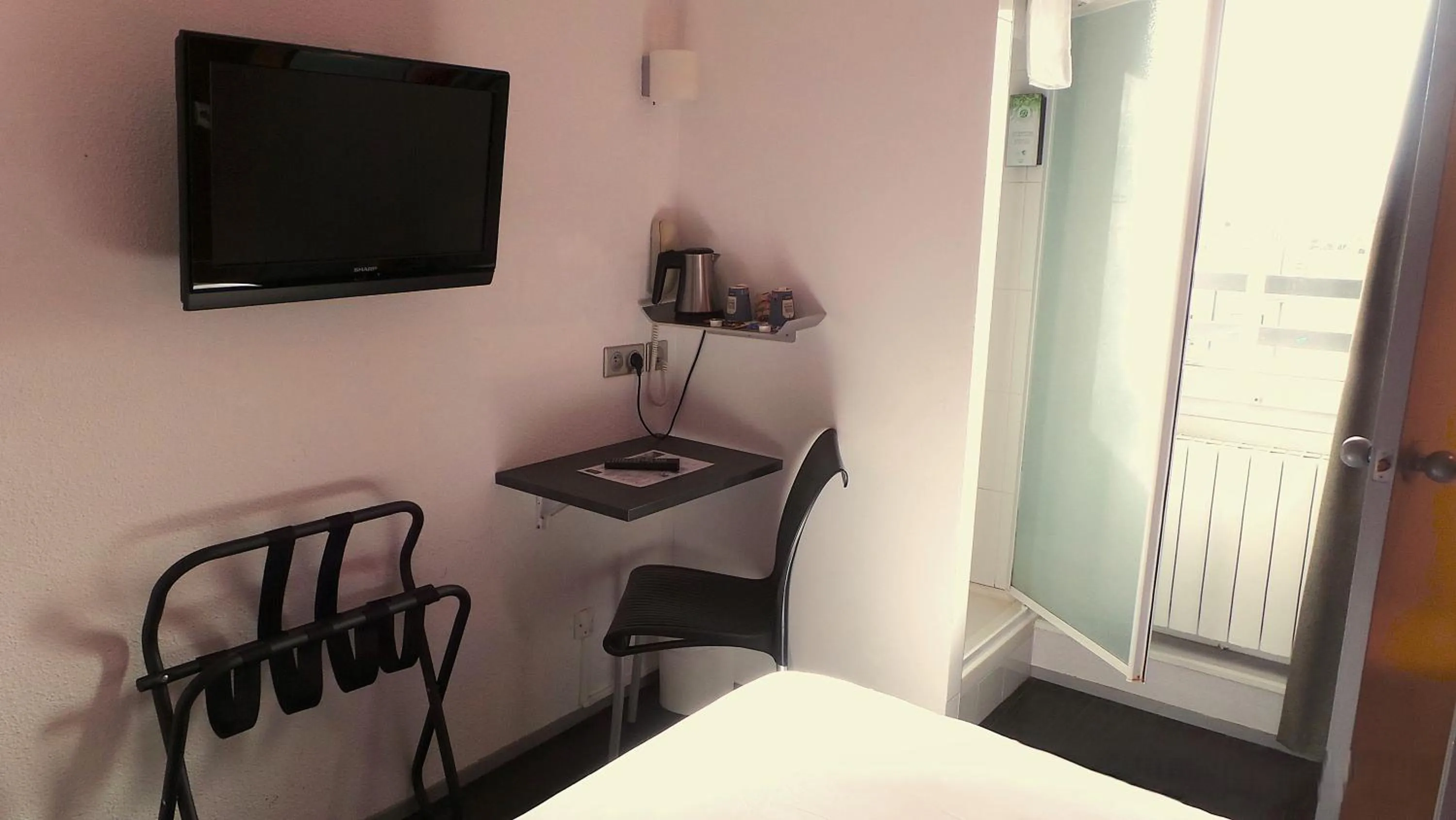 Bed in Kyriad Quimper Sud