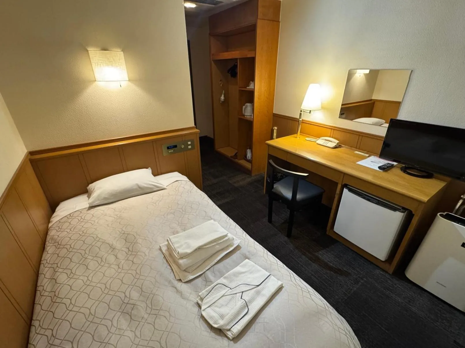 Bed in Ohta Grand Hotel