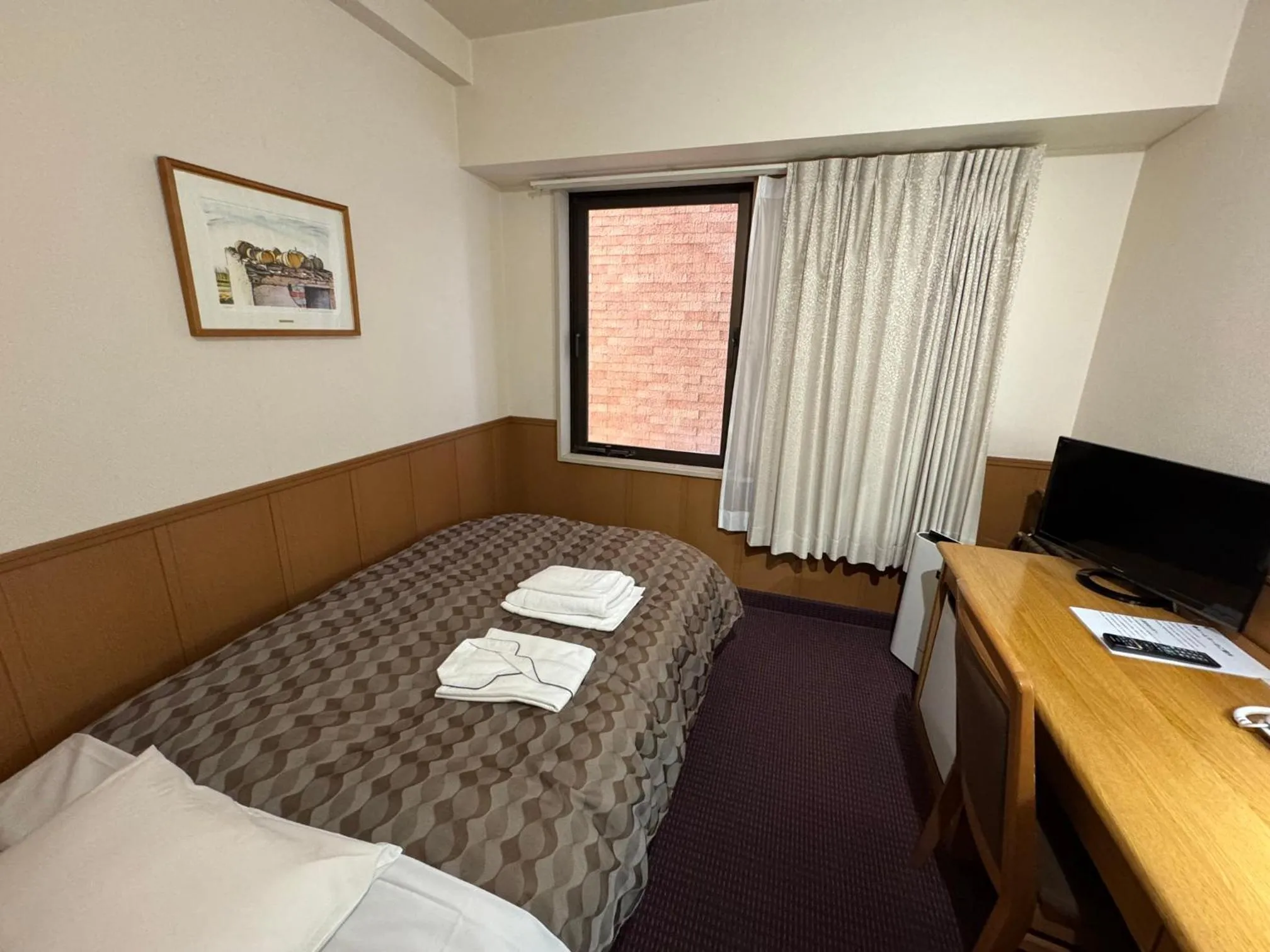 Bed in Ohta Grand Hotel