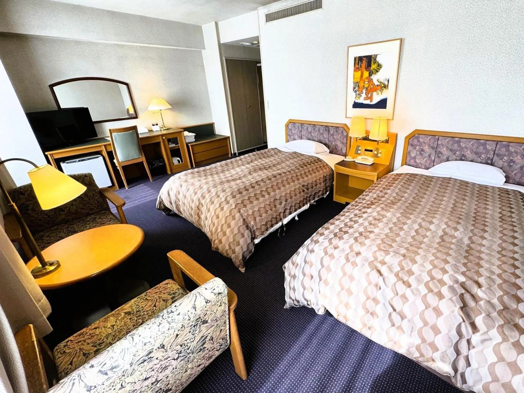 Bed in Ohta Grand Hotel