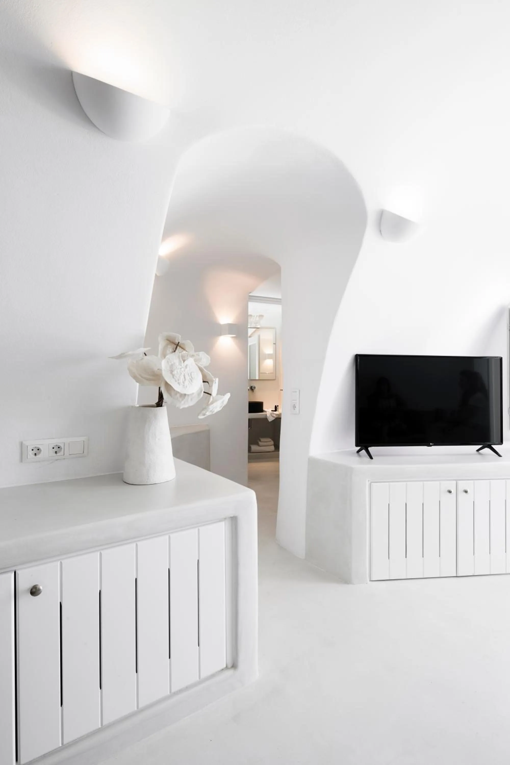 Communal lounge/ TV room in Dana Villas & Infinity Suites