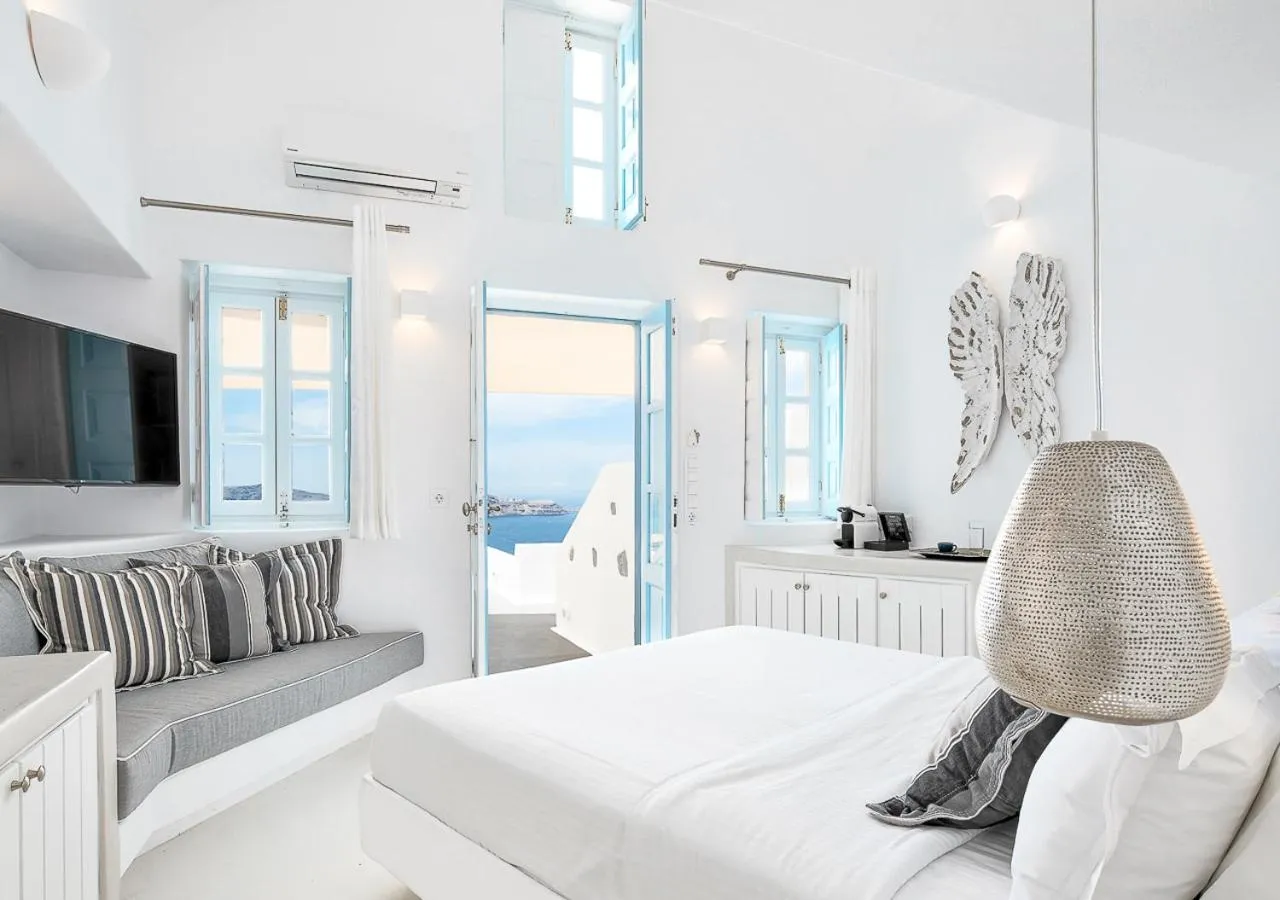 Bed in Dana Villas & Infinity Suites