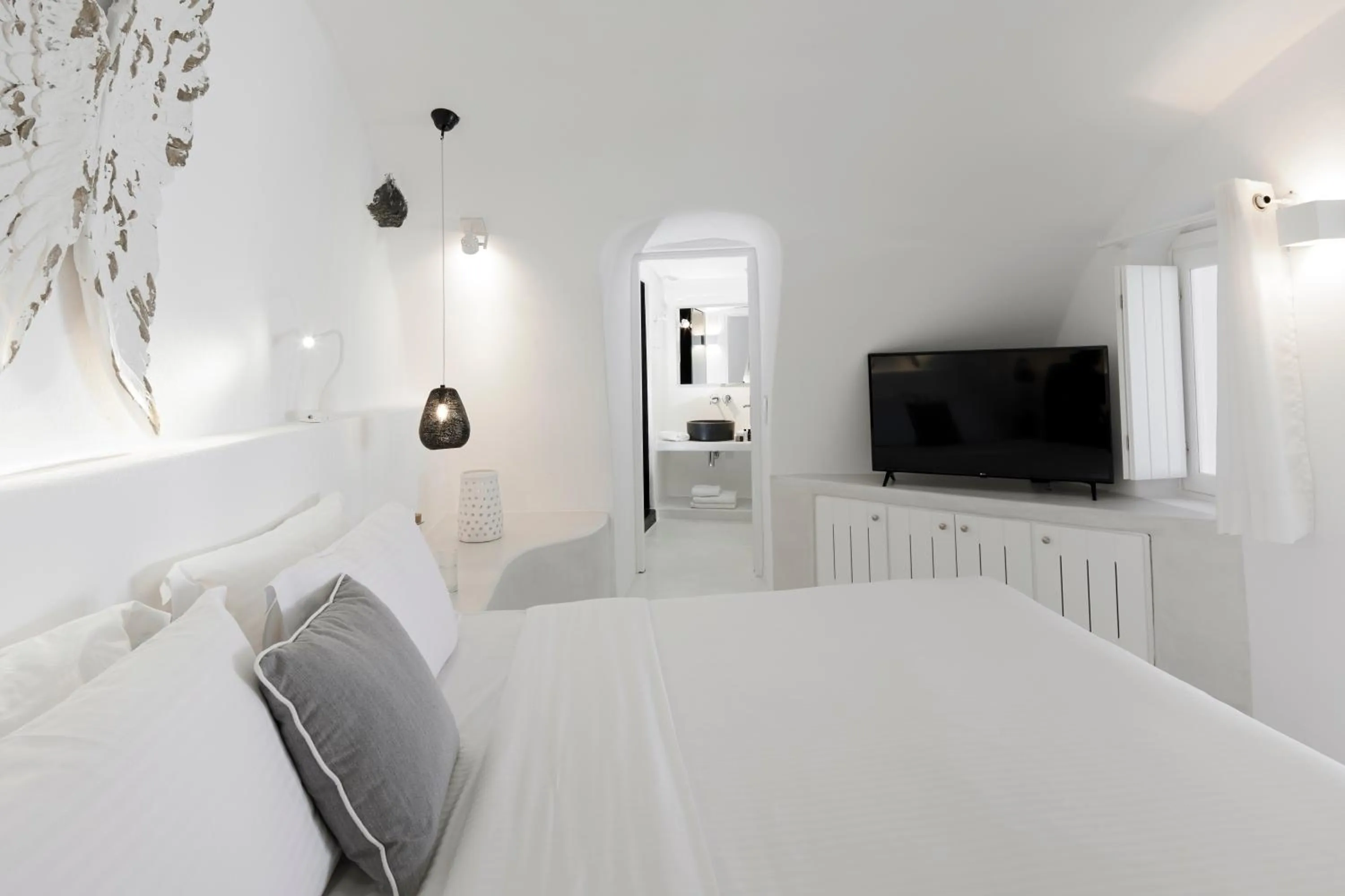 Bed in Dana Villas & Infinity Suites