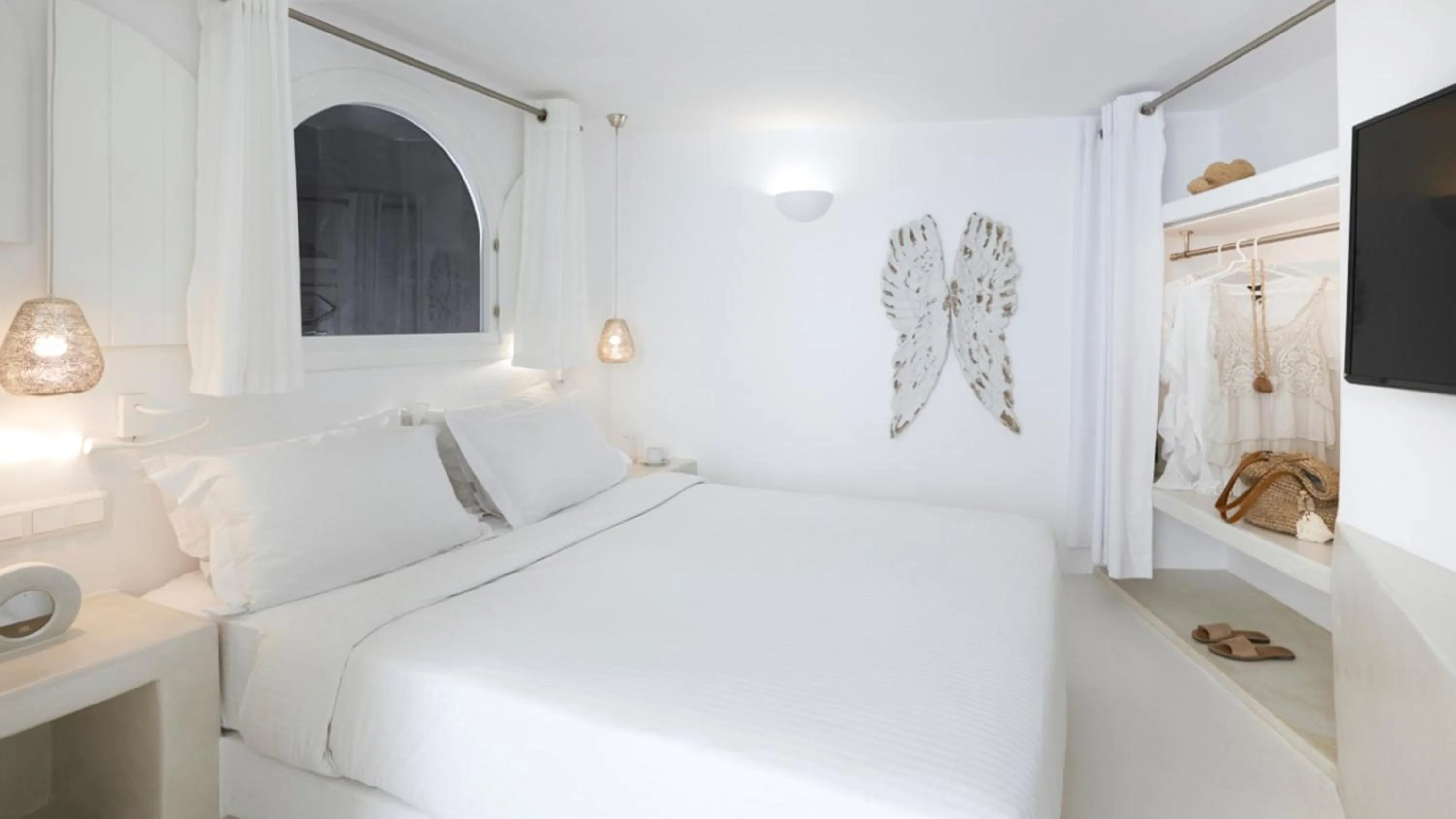 Bed in Dana Villas & Infinity Suites