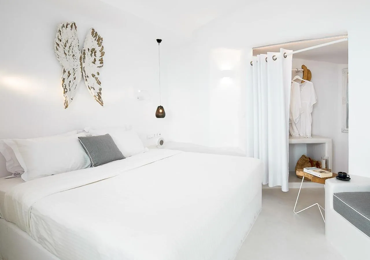 Bed in Dana Villas & Infinity Suites