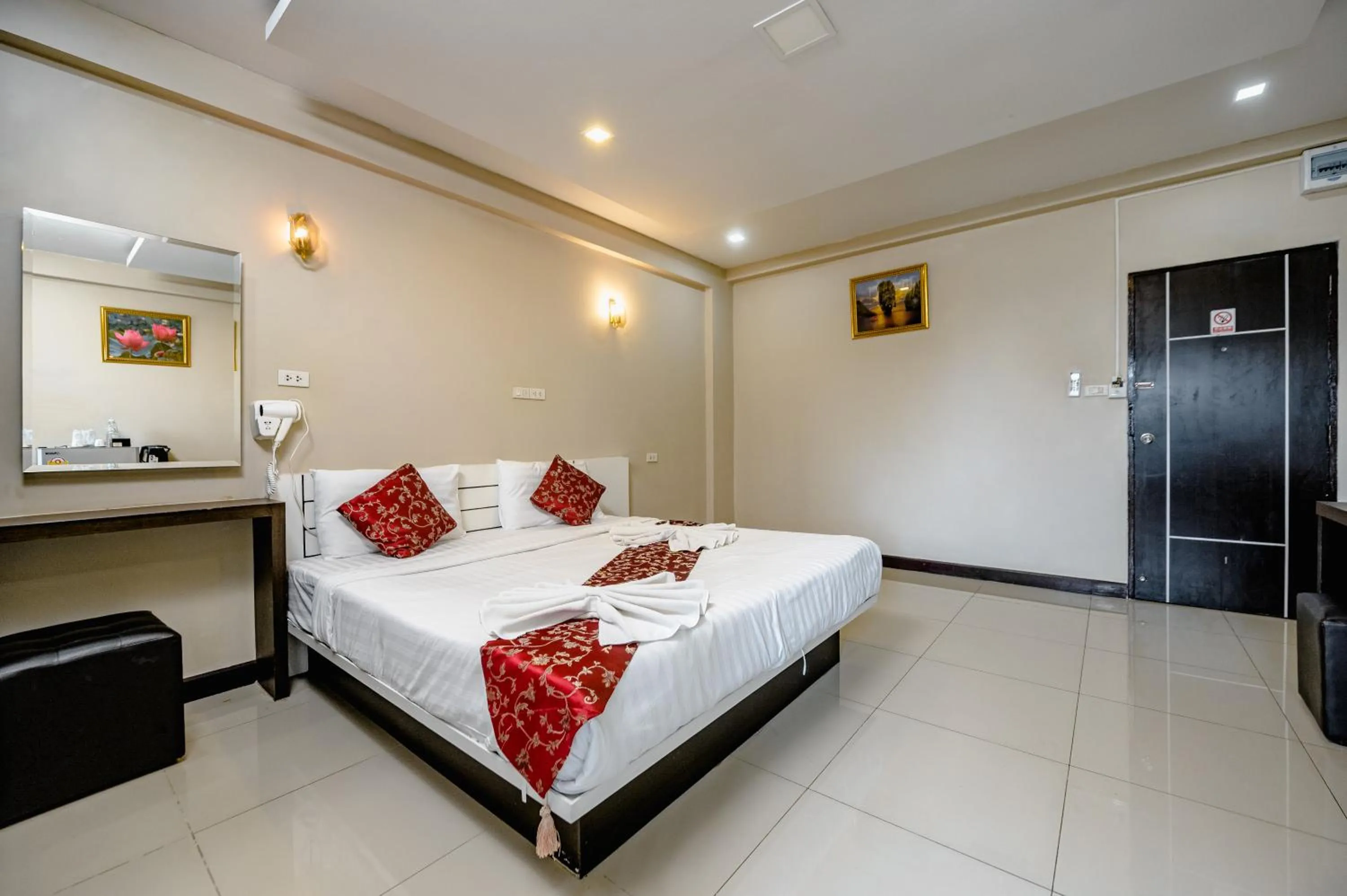 Bed in Gold Airport Suites