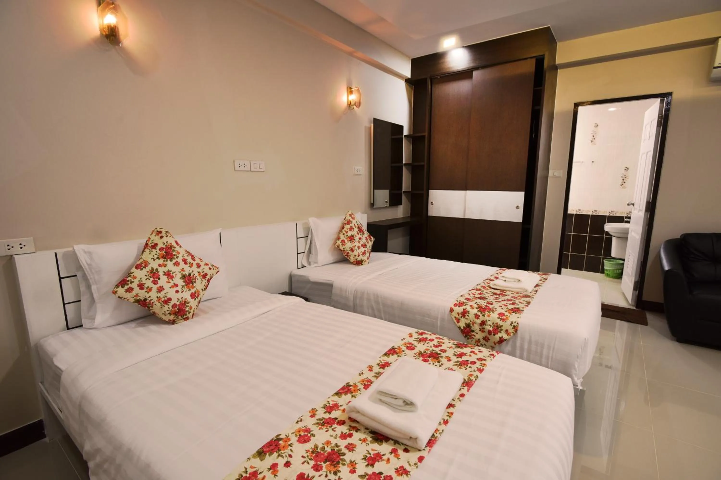 Bed in Gold Airport Suites