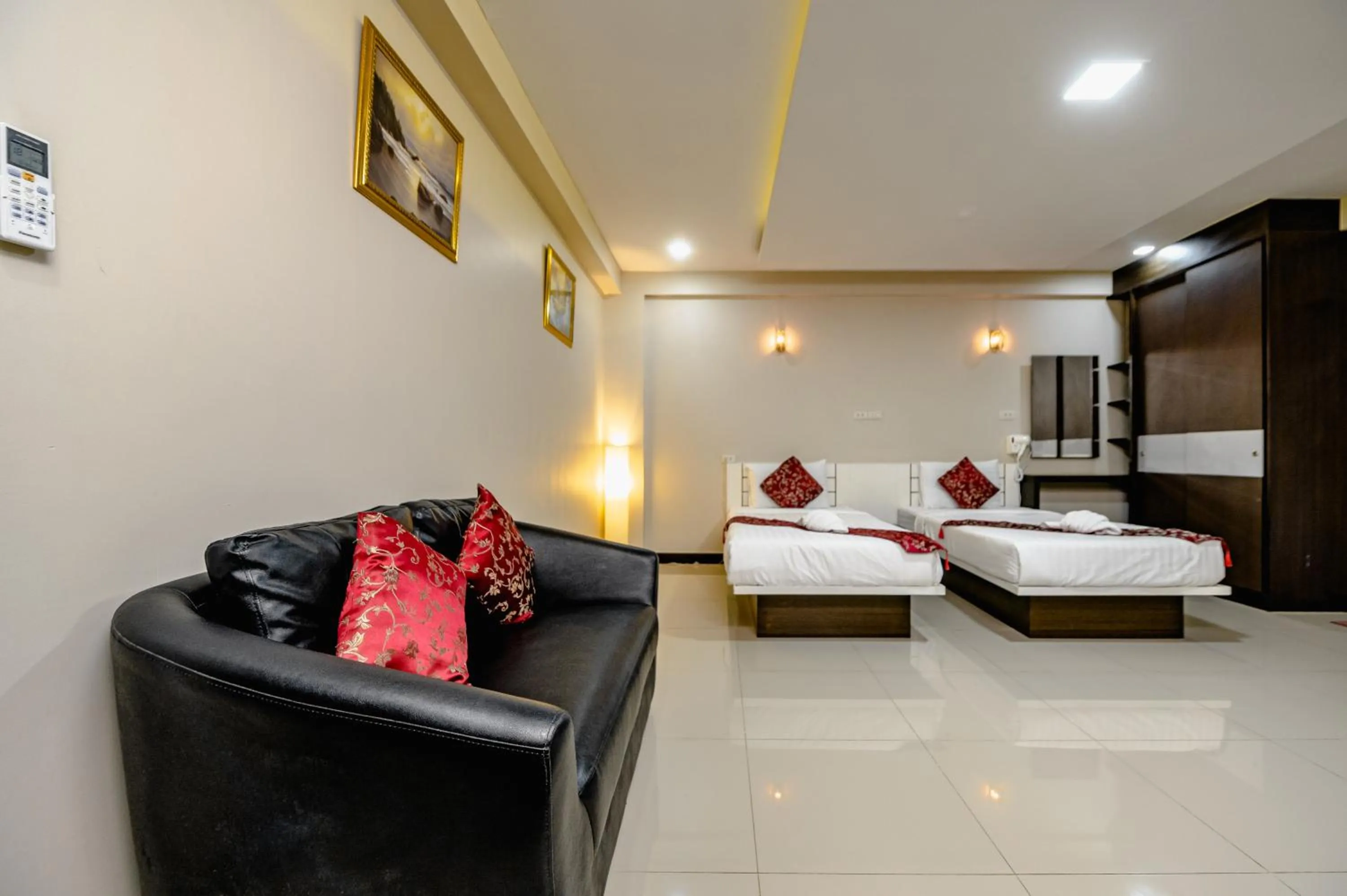 Bed in Gold Airport Suites