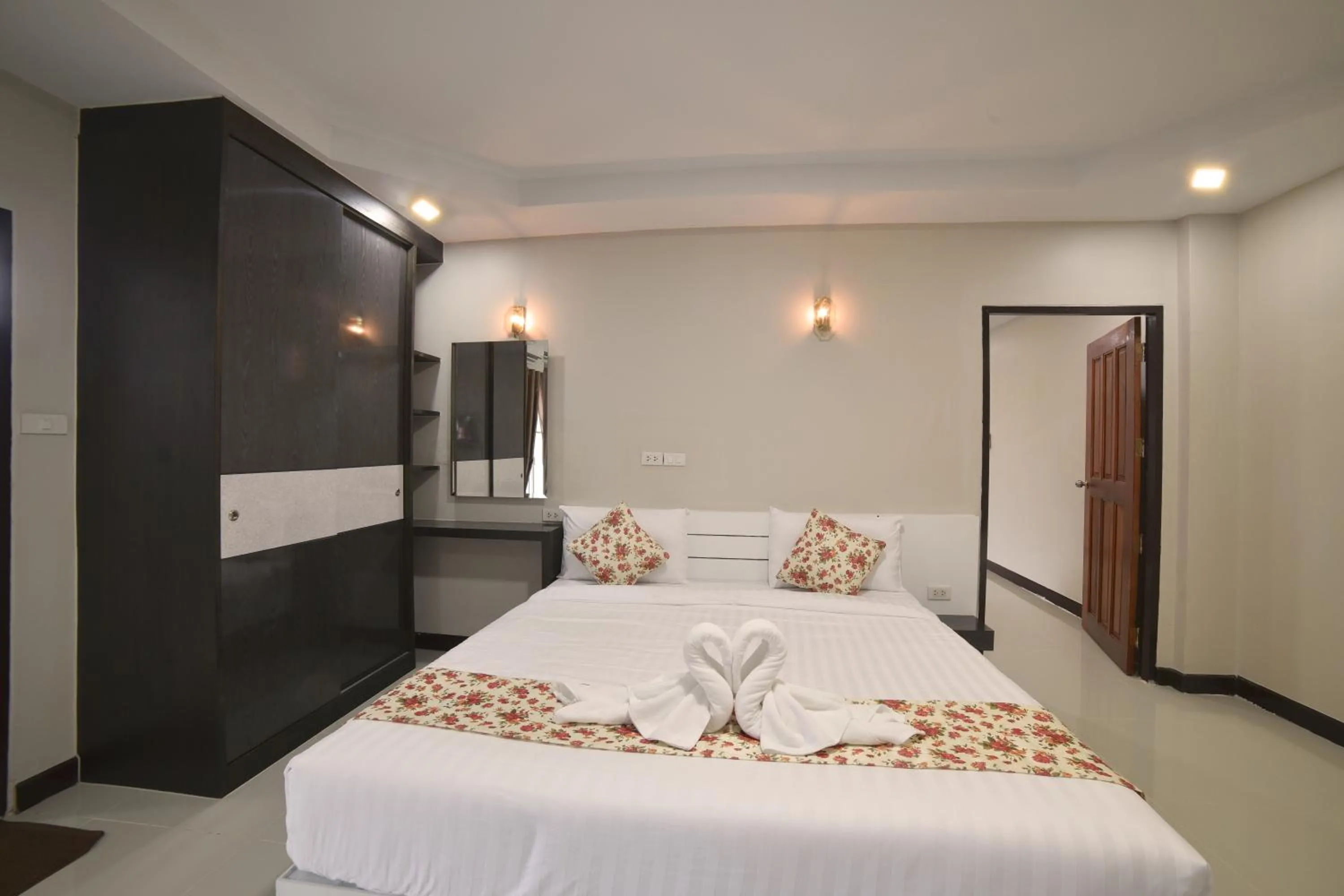 Bed in Gold Airport Suites