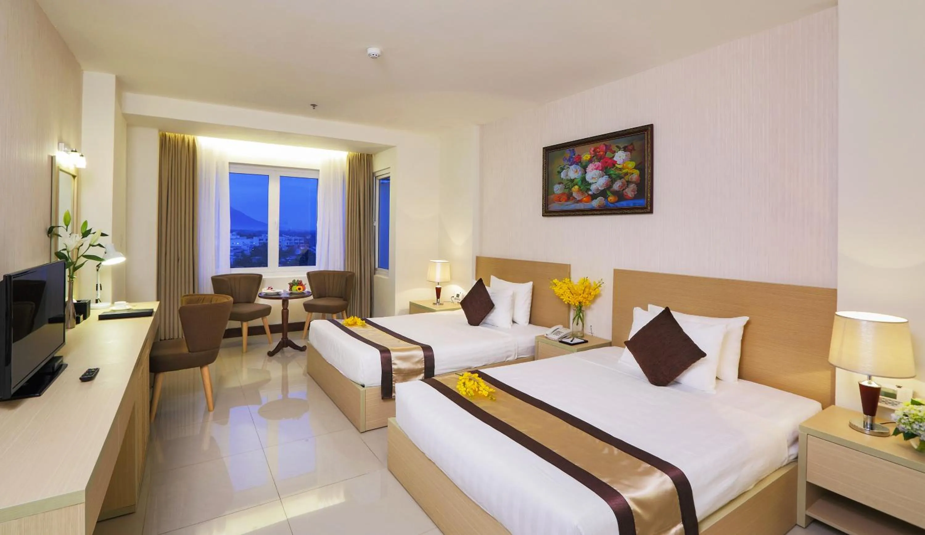 Bed in Sunrise Hotel