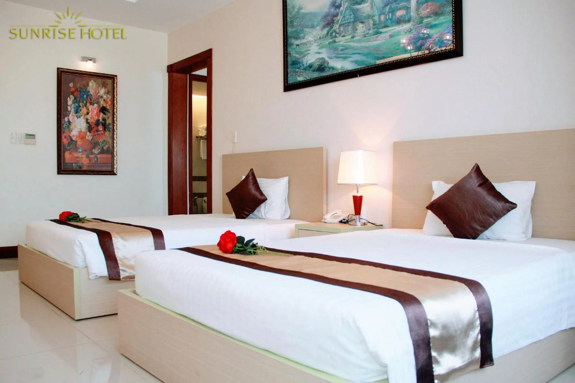 Bed in Sunrise Hotel