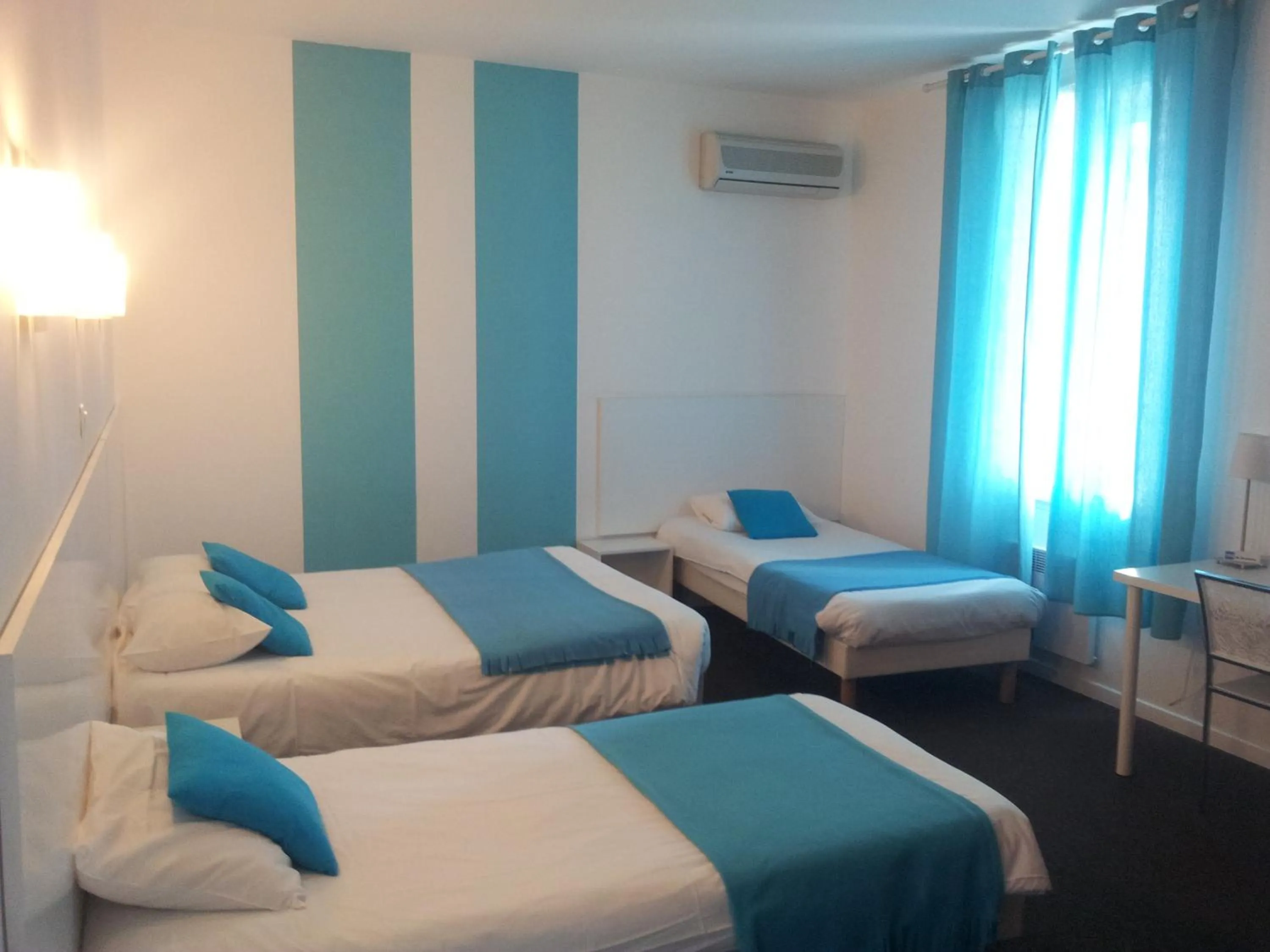 Photo of the whole room, Bed in Hôtel Du Midi