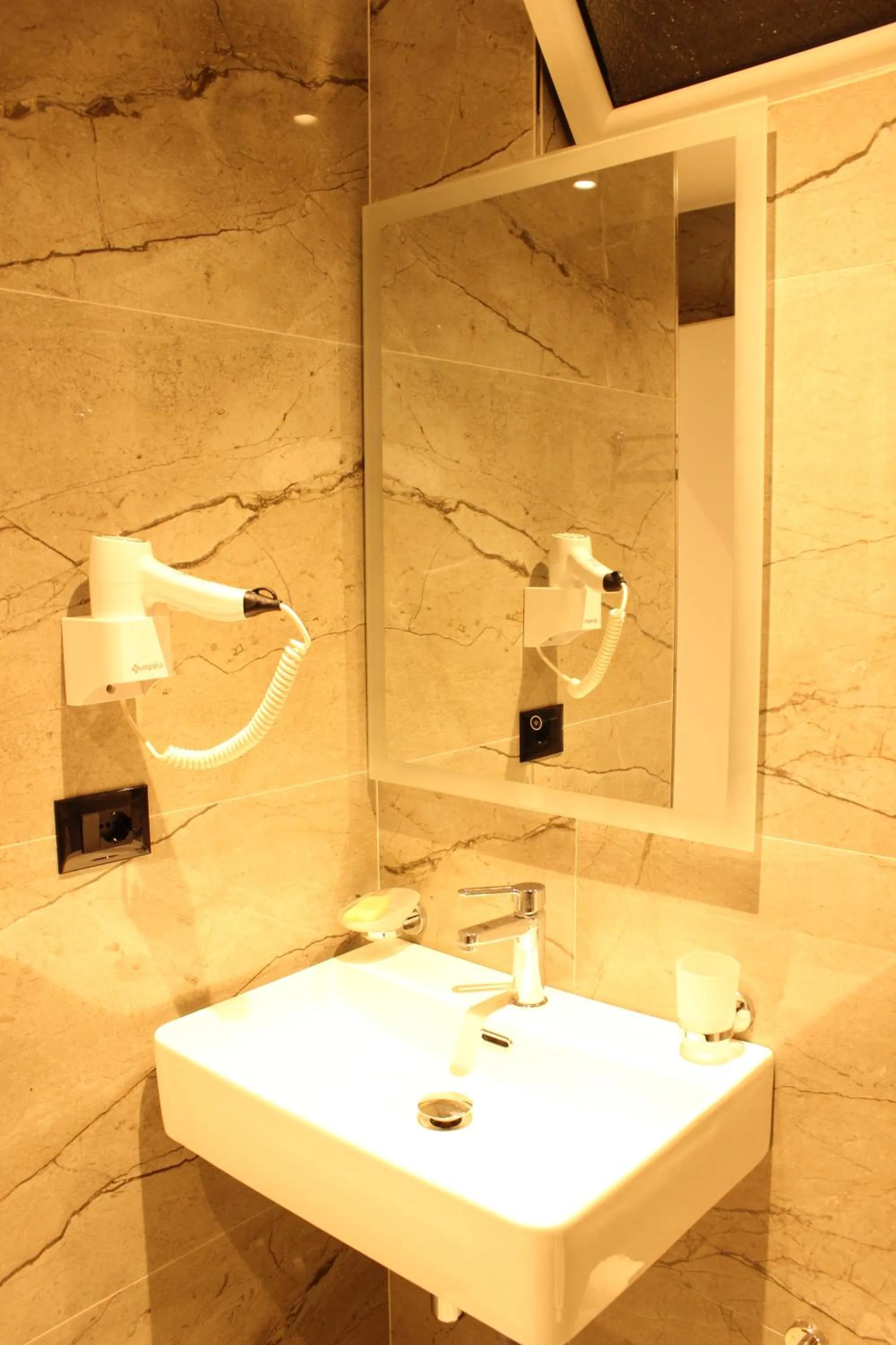 Shower in Bebi Hotel And Apartments