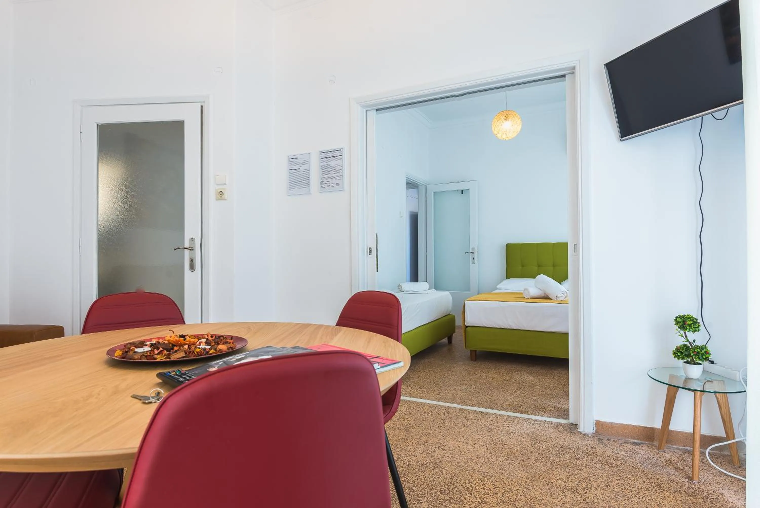 Bed in Super Paradise Apartments