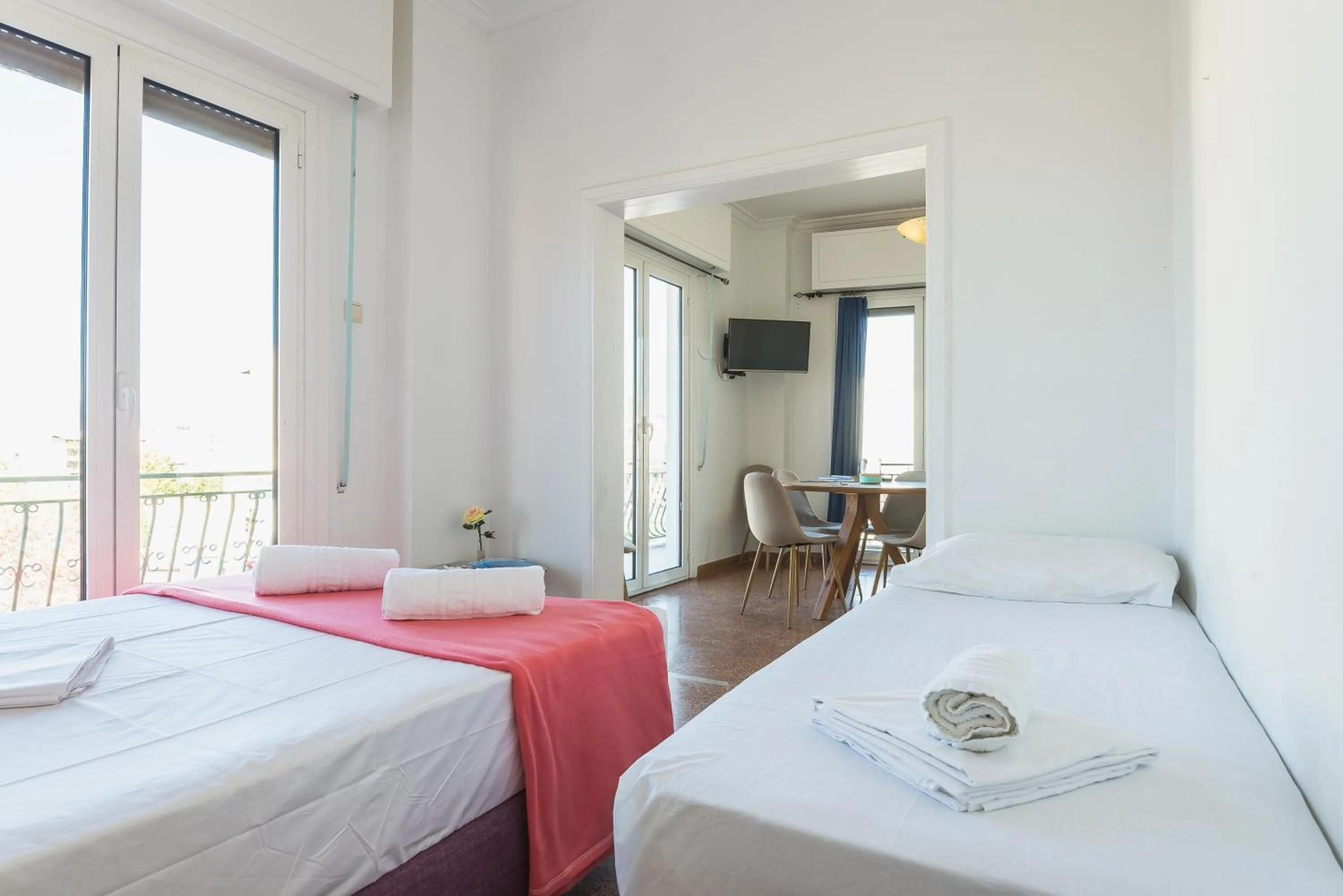 Bed in Super Paradise Apartments