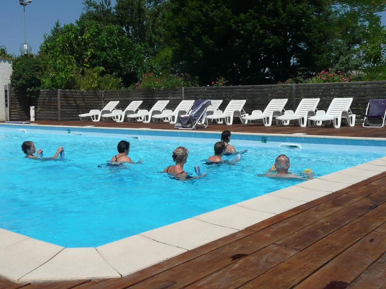 Swimming pool in Bungalows & Rooms - Gît'Ôstal