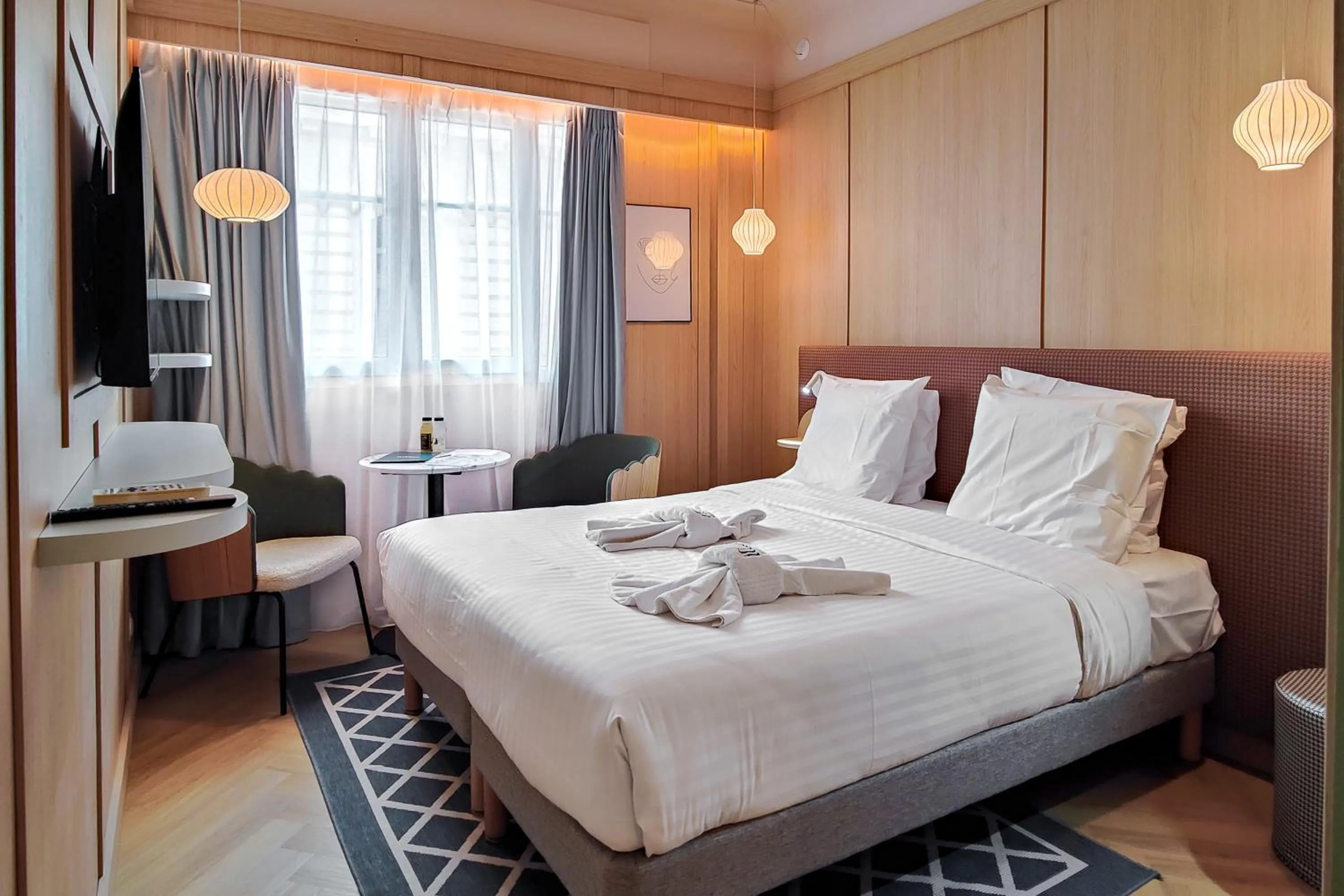 Photo of the whole room, Bed in Hotel Aparthotel AMMI Nice Lafayette