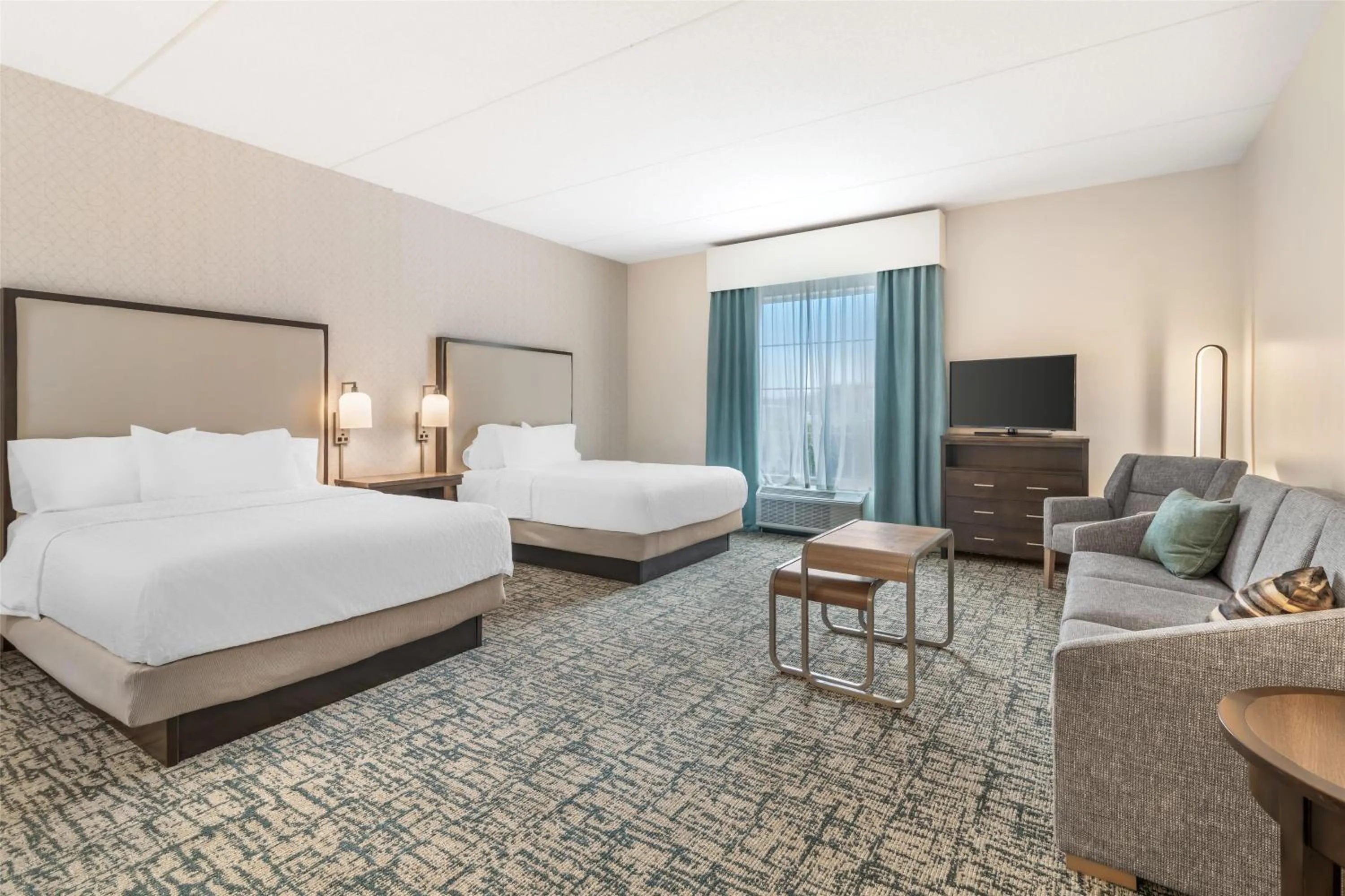 Living room, Bed in Homewood Suites By Hilton Schenectady