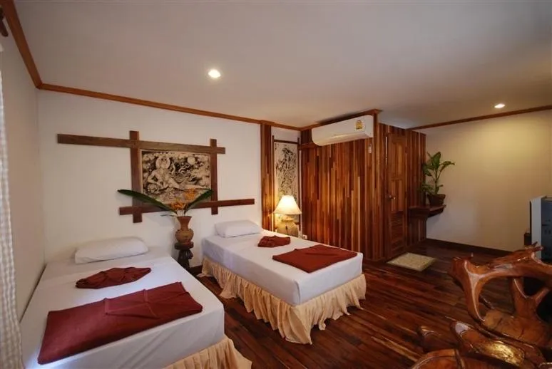 Bed in Tropical Garden Bungalow