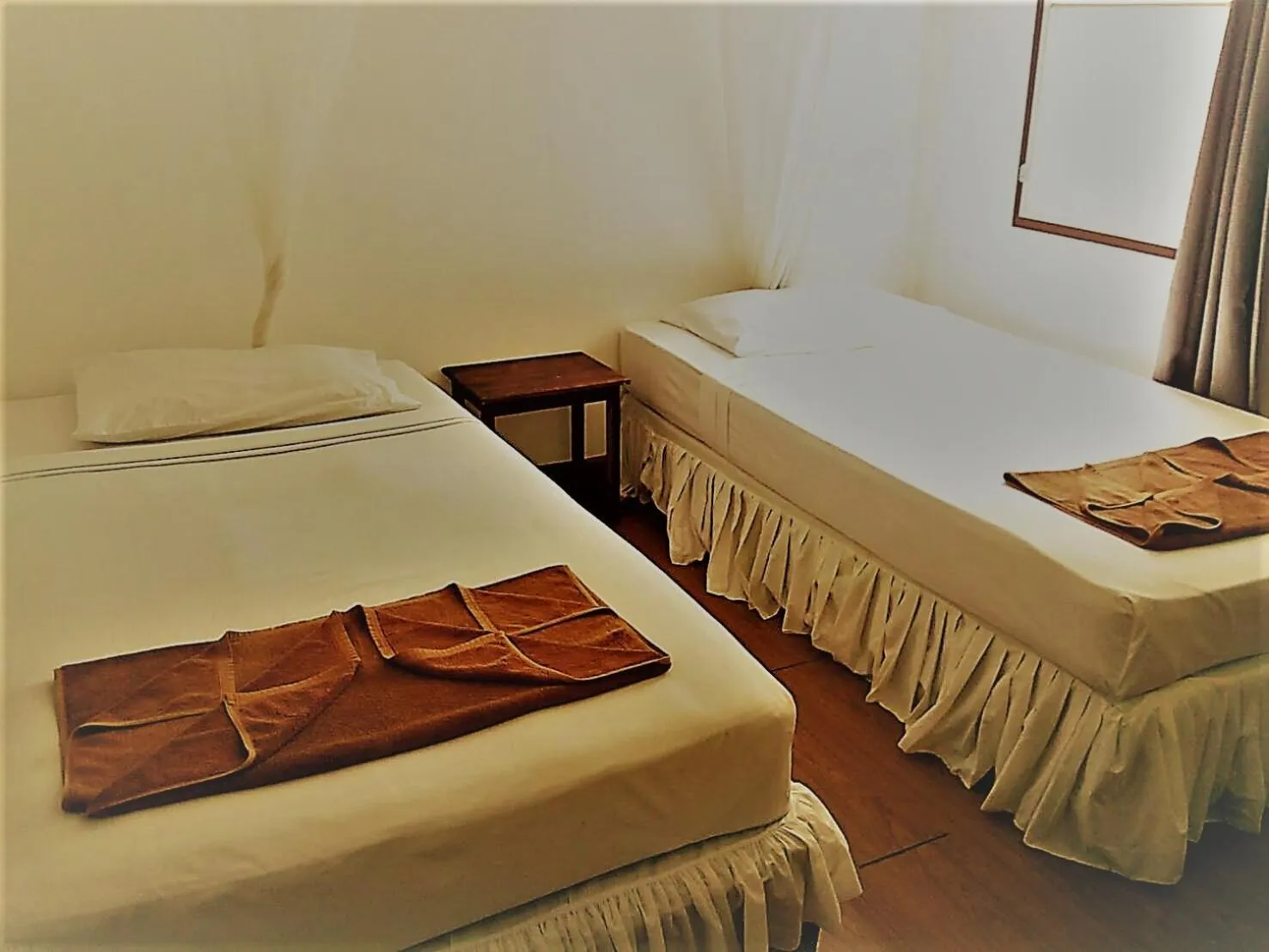 Bed in Tropical Garden Bungalow